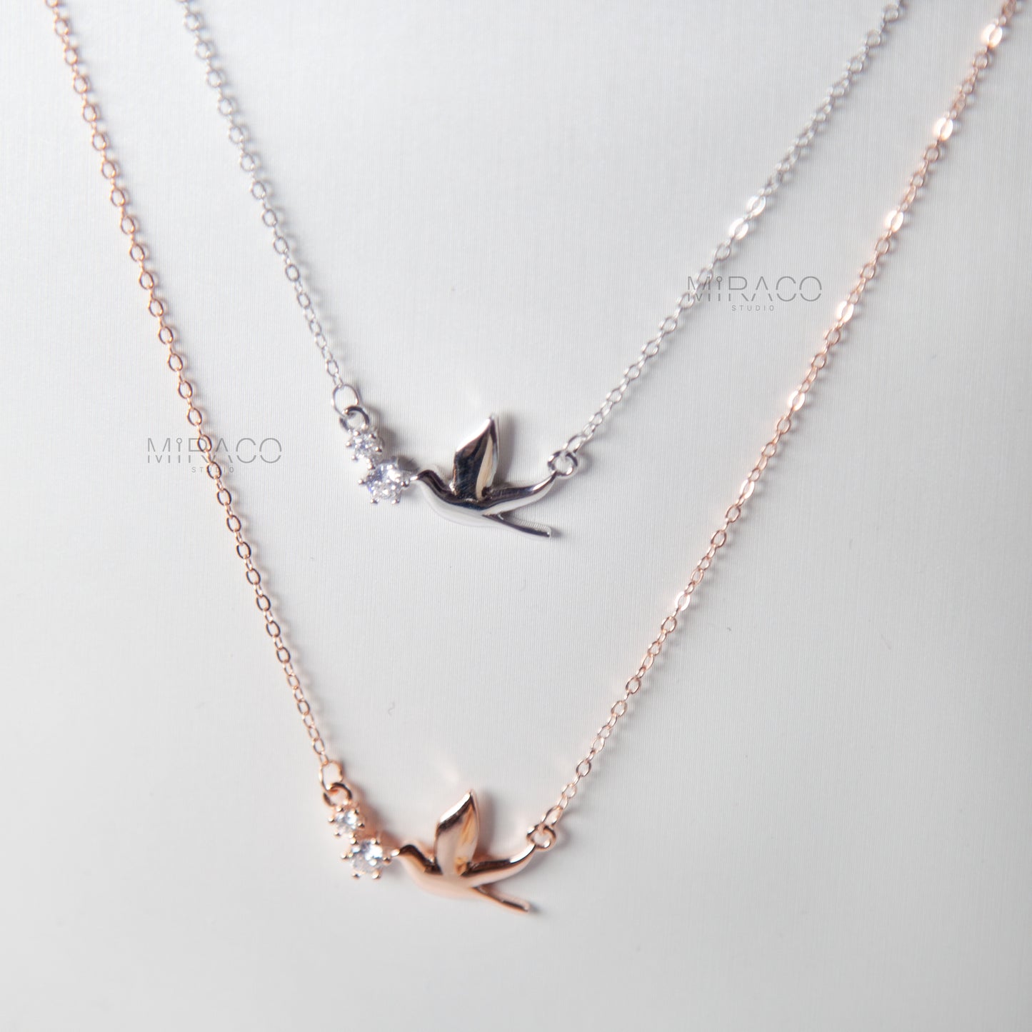 A Delicate Tribute to Freedom and Grace.
This beautifully crafted sterling silver necklace features a peaceful pigeon bird pendant, accented with a tiny diamond-style crystal for a soft, elegant shimmer. Available in both silver and rose gold finishes, this meaningful piece brings a sense of calm, love, and lightness to your everyday look.
Whether worn alone or layered, this necklace is a charming reminder of freedom, hope, and quiet strength.
