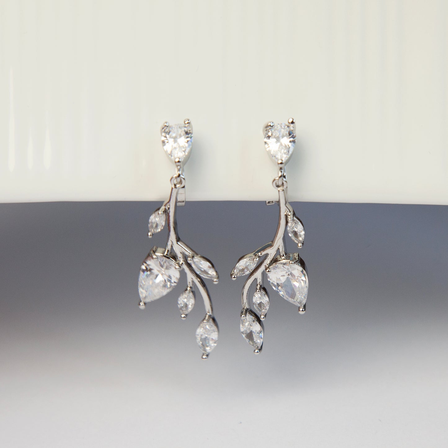 Clip On Diamond Earrings, Mini-Clip Dangle Earrings, Non-Pierced Plant Bridal Wedding Earrings
Our Mini-Clip Dangle Earrings are the perfect choice for those seeking subtle elegance or with small earlobes. Enjoy stylish charm and comfort in a compact design.