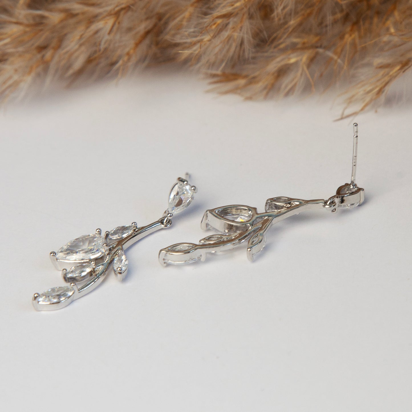 Clip On Diamond Earrings, Mini-Clip Dangle Earrings, Non-Pierced Plant Bridal Wedding Earrings
Our Mini-Clip Dangle Earrings are the perfect choice for those seeking subtle elegance or with small earlobes. Enjoy stylish charm and comfort in a compact design.