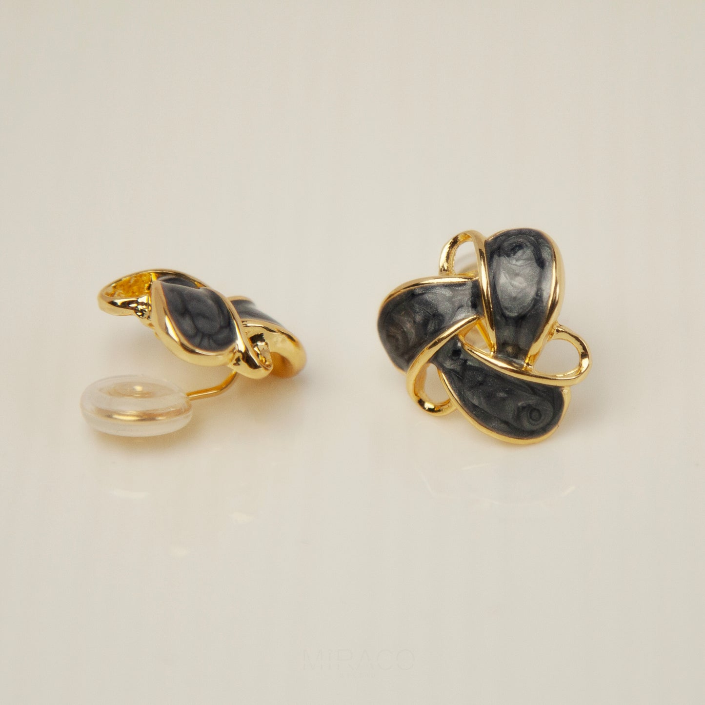 Clip On Stud Earrings Gold-Tone Blue Knot Geometric Earrings, Non Pierced Stud Earrings, Twist Knot Stud Earrings, Medium Blue-gray Studs
