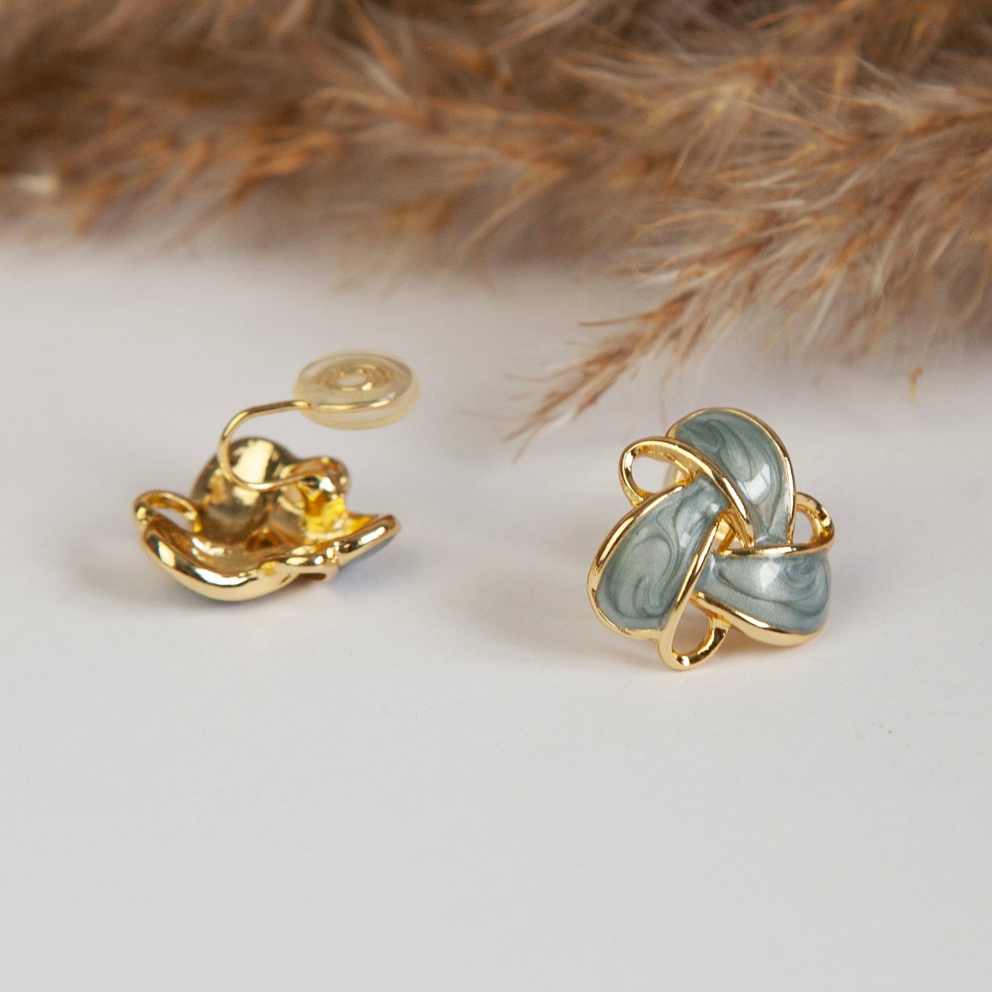 Clip On Stud Earrings Gold-Tone Blue Knot Geometric Earrings, Non Pierced Stud Earrings, Twist Knot Stud Earrings, Medium Blue-gray Studs