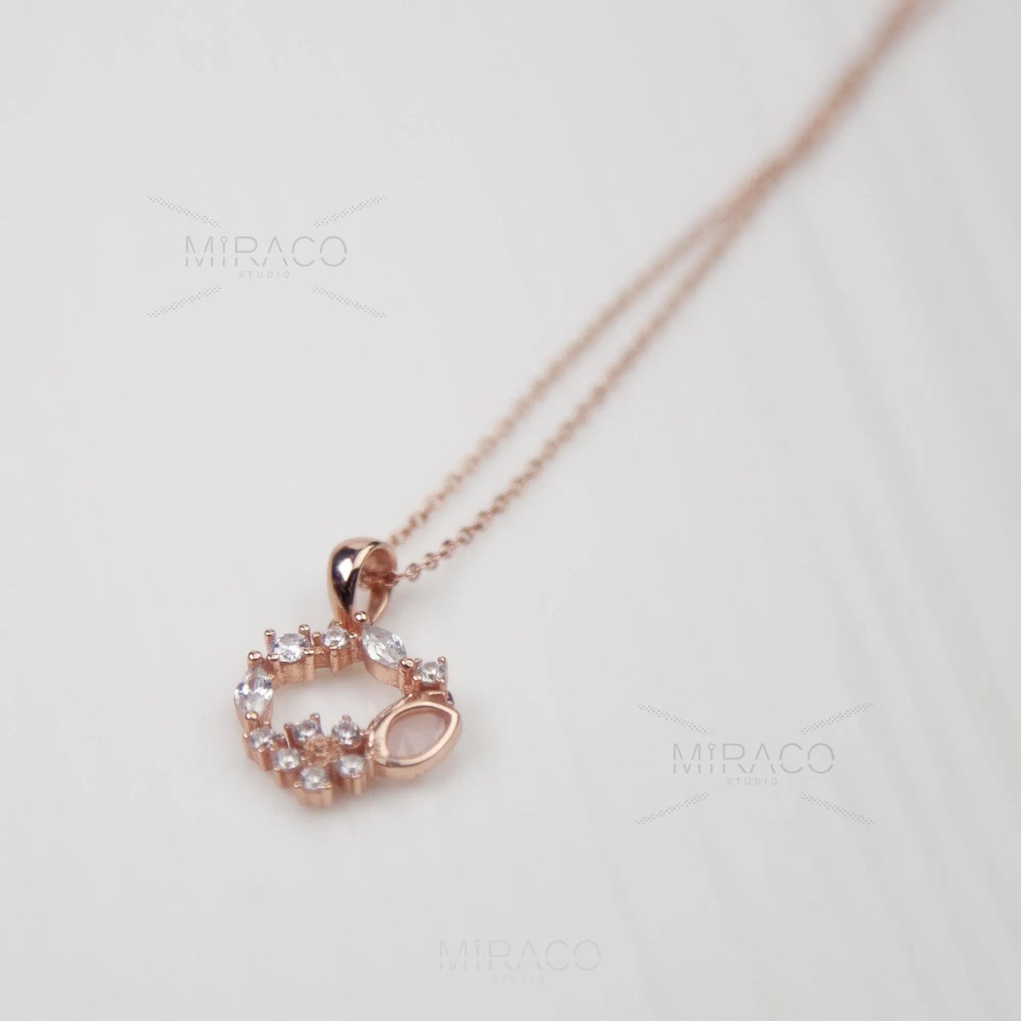 Discover enchanting elegance with our Flower Wreath Necklace. Crafted from high-quality, genuine 925 sterling silver and finished with a warm rose gold color, this piece offers both durability and on-trend style.