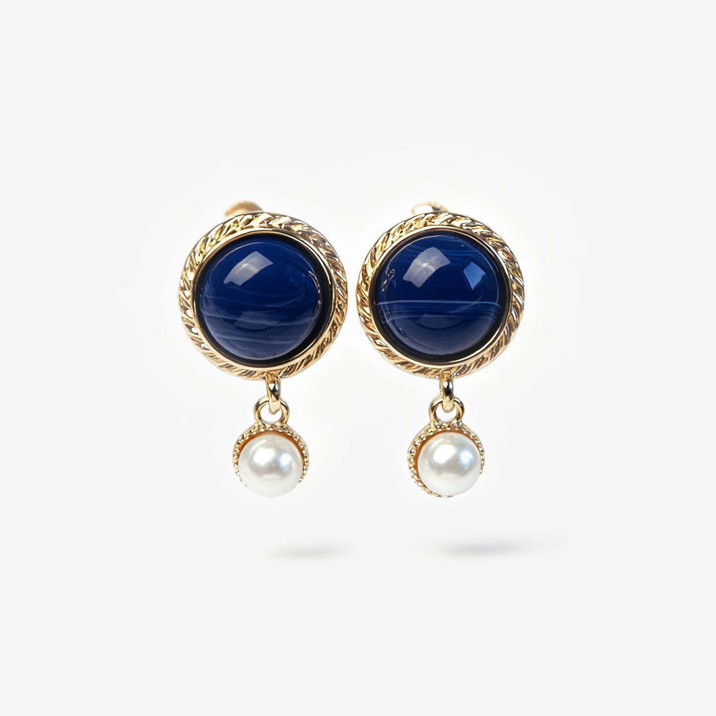 navy and pearl clip-on earrings