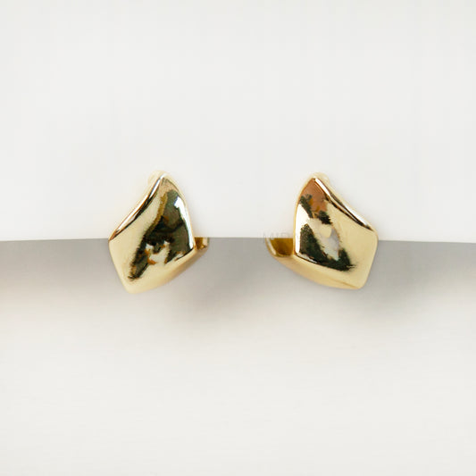 Gold geometric clip-on stud earrings with coil-back clips, minimal modern design for non-pierced ears.