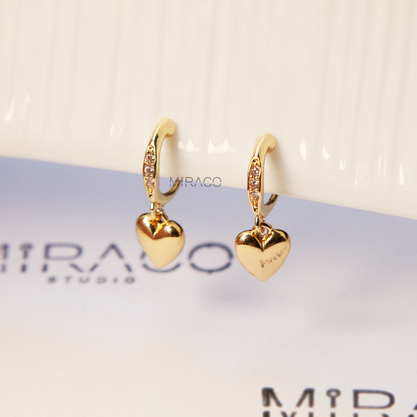 Gold Heart Dangle Clip-On Earrings