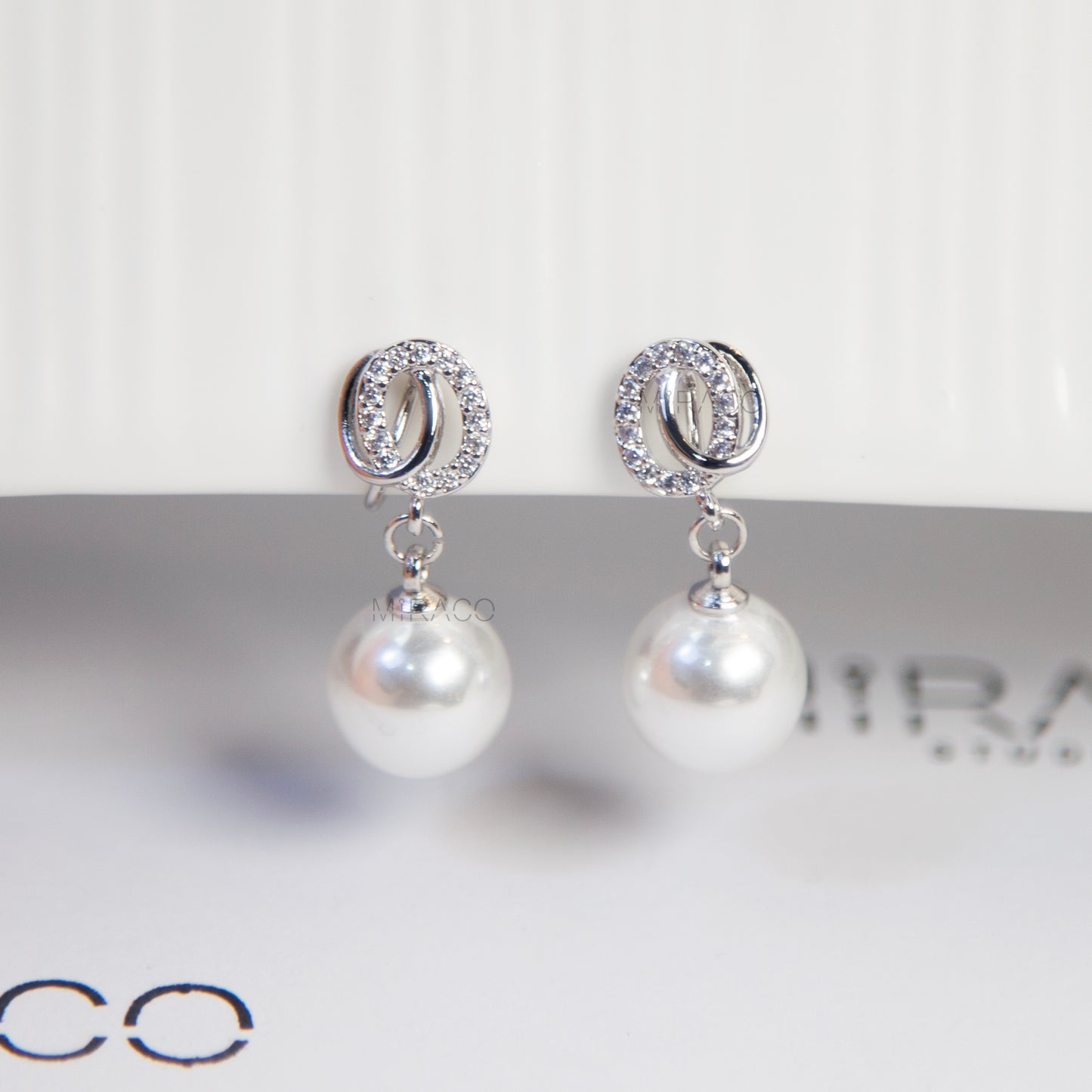 Silver Clip-On Earrings with Pearl Drop