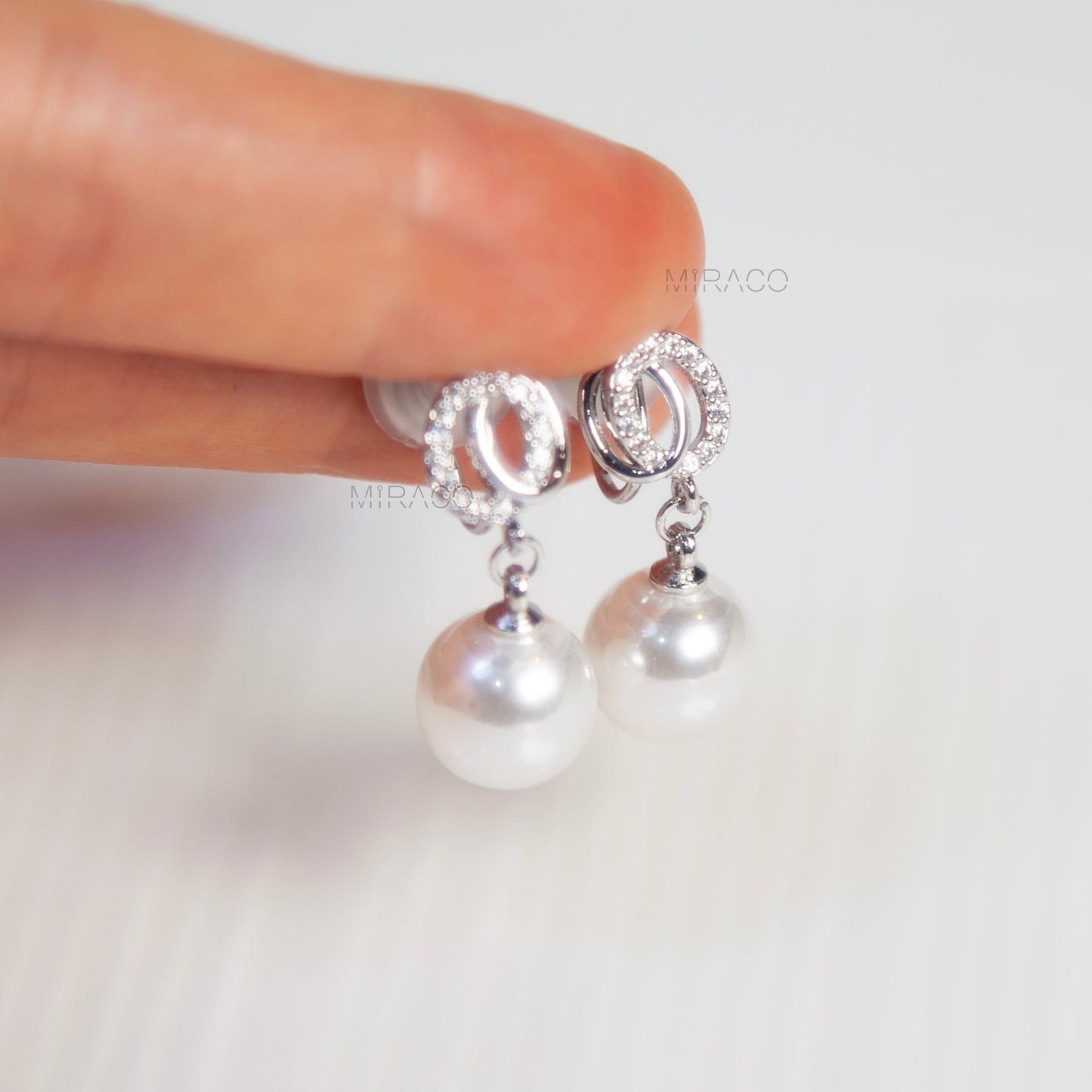 Silver Clip-On Earrings with Pearl Drop