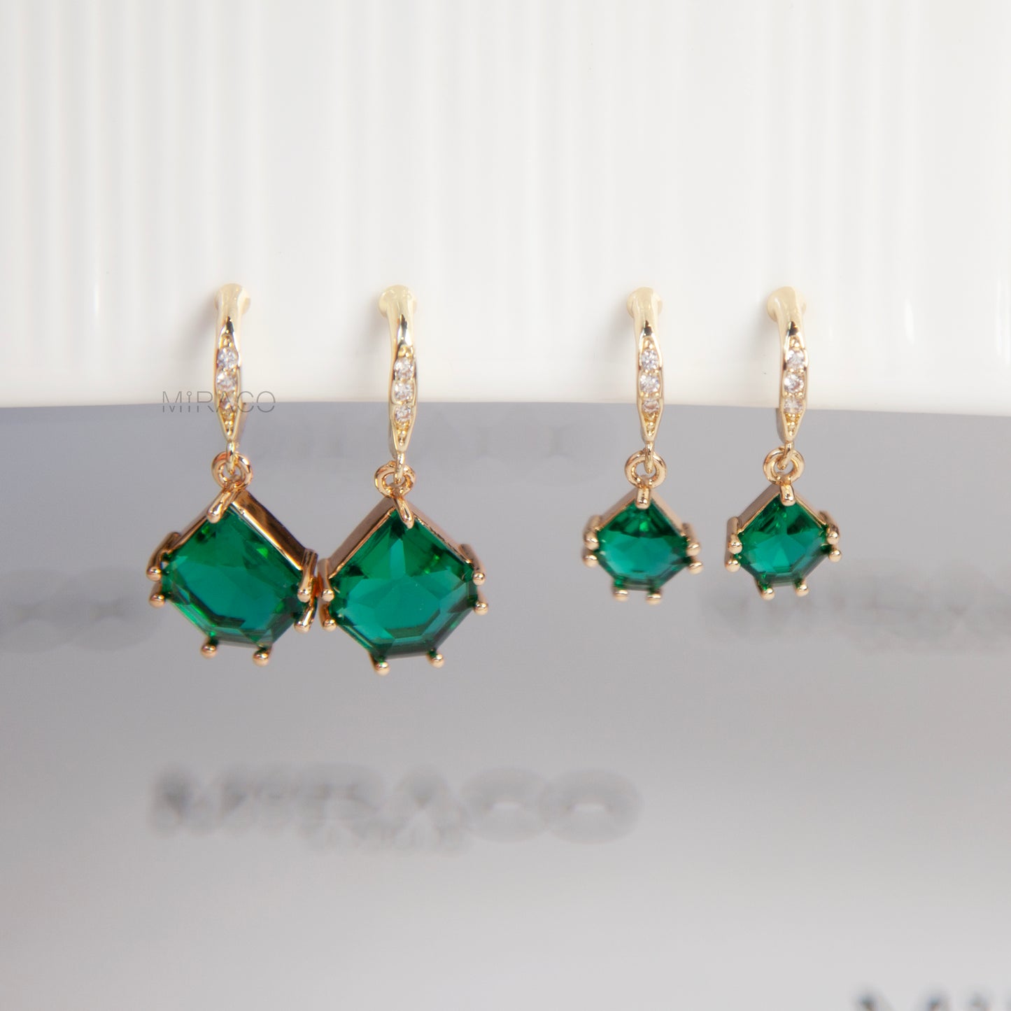 Green Gem Clip-On Earrings – Gold Dangle with Sparkle