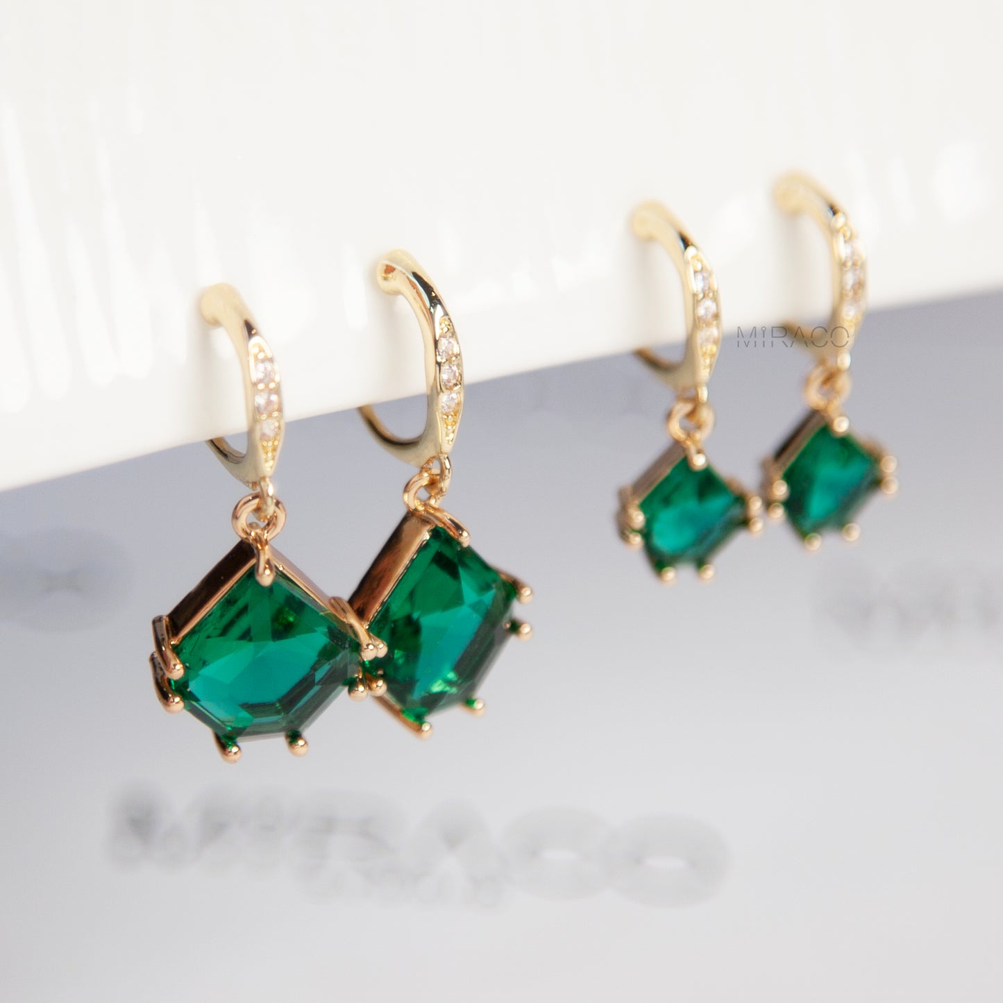 Green Gem Clip-On Earrings – Gold Dangle with Sparkle
