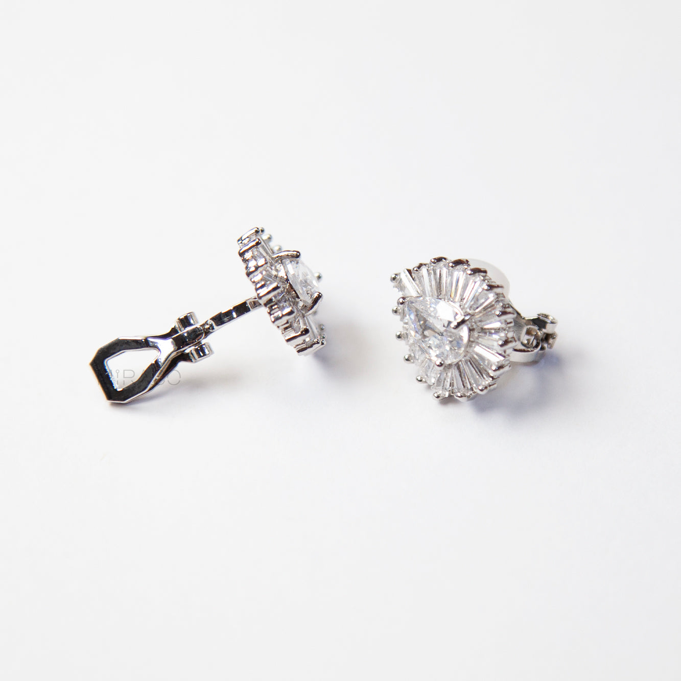 Pear-Shaped CZ Sunburst Clip-On Earrings – Gold or Silver