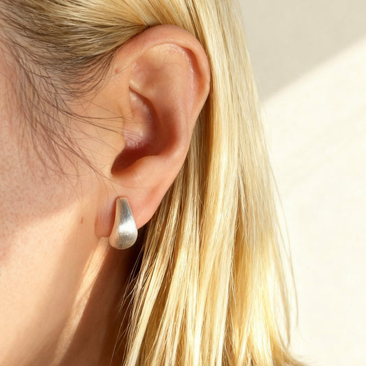 brushed silver clip-on earrings, dome hoop clip-ons, silver coil back earrings, non pierced hoop earrings, matte silver hoop earrings, clip-on everyday earrings, brushed finish earrings, classic silver dome hoops