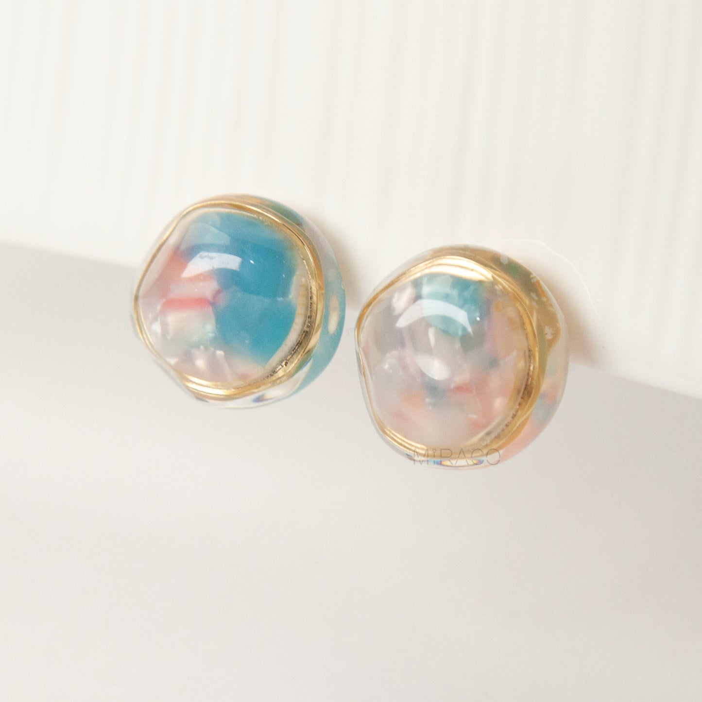 clip on earrings coil back, vintage style clip on earrings, dome resin earrings, blue pink clip on earrings, non pierced earrings gold trim, retro clip on earrings, resin dome jewellery, coil back earrings for women, lightweight clip on earrings