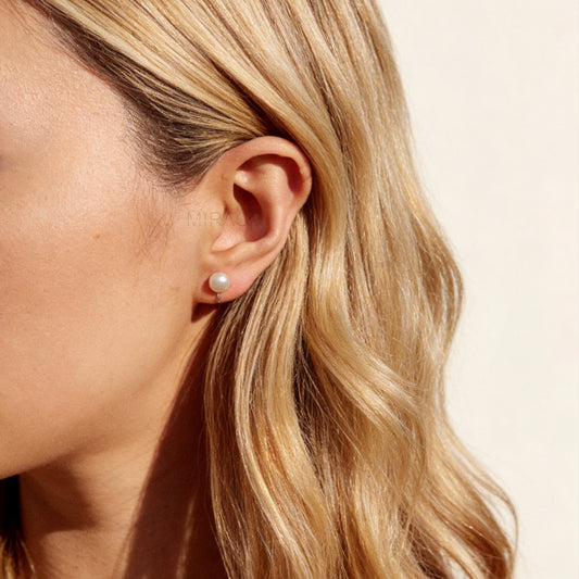 round freshwater pearl clip-on earrings with clear silicone comfort backs