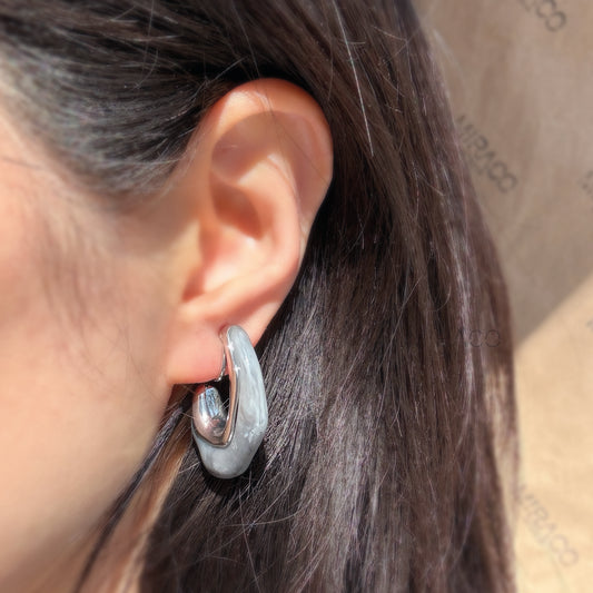 clip-on earrings no piercing
screw back clip-on earrings
silver resin clip-on earrings
stylish earrings for non-pierced ears
molten wave earrings
lightweight clip-on earrings