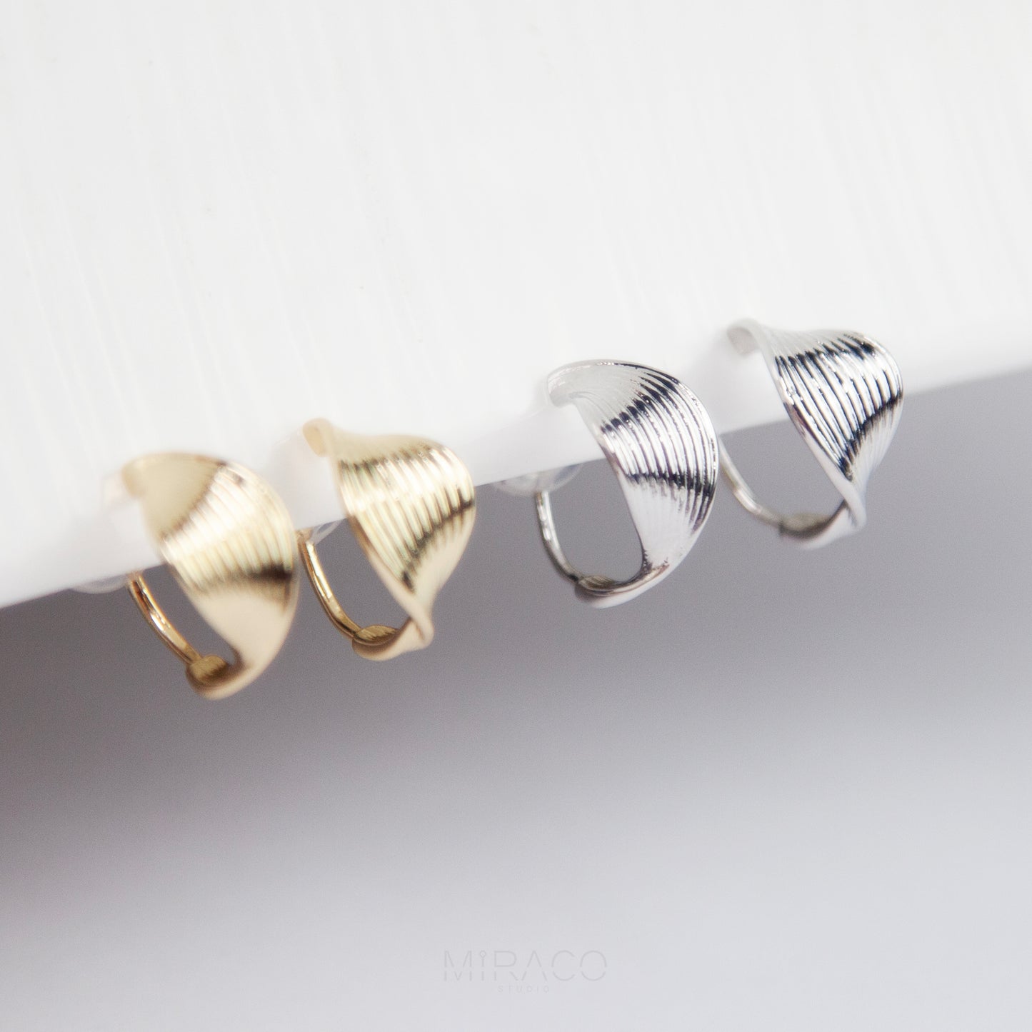 Twisted Hoop Clip On Earrings