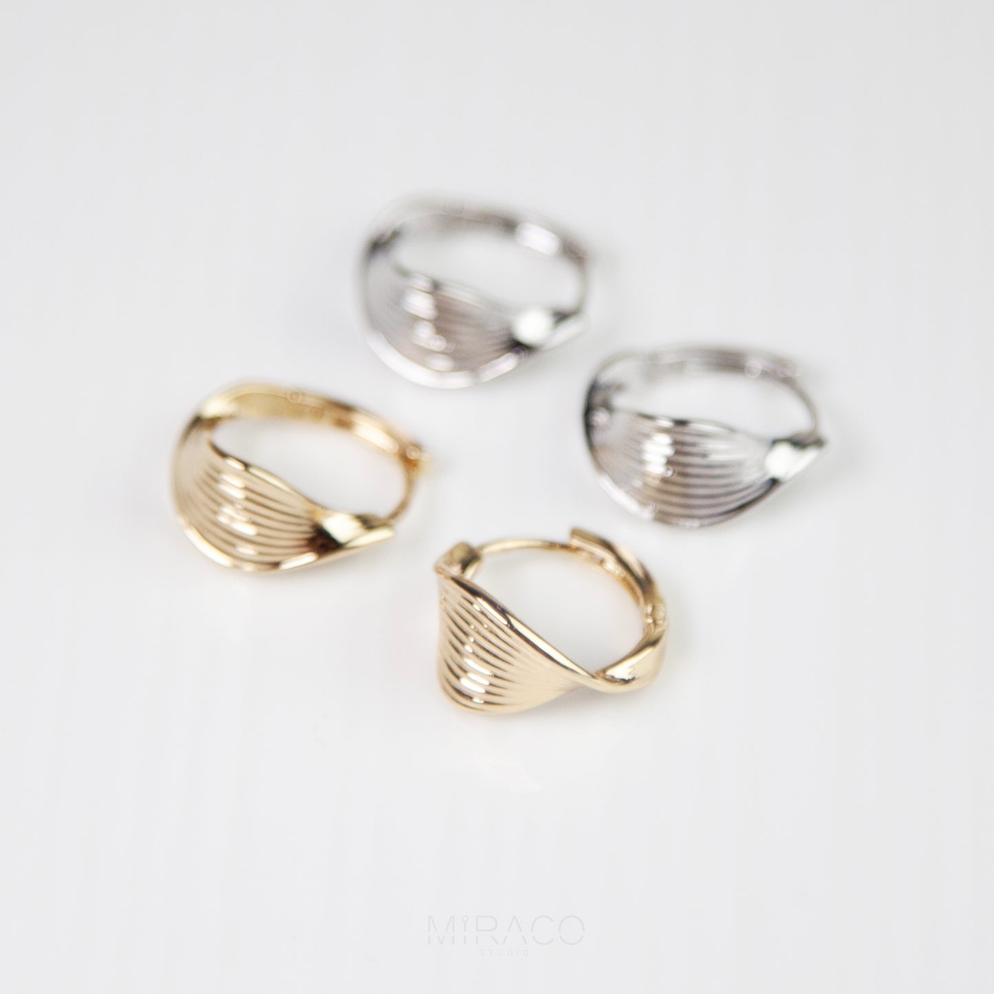 Twisted Hoop Clip On Earrings