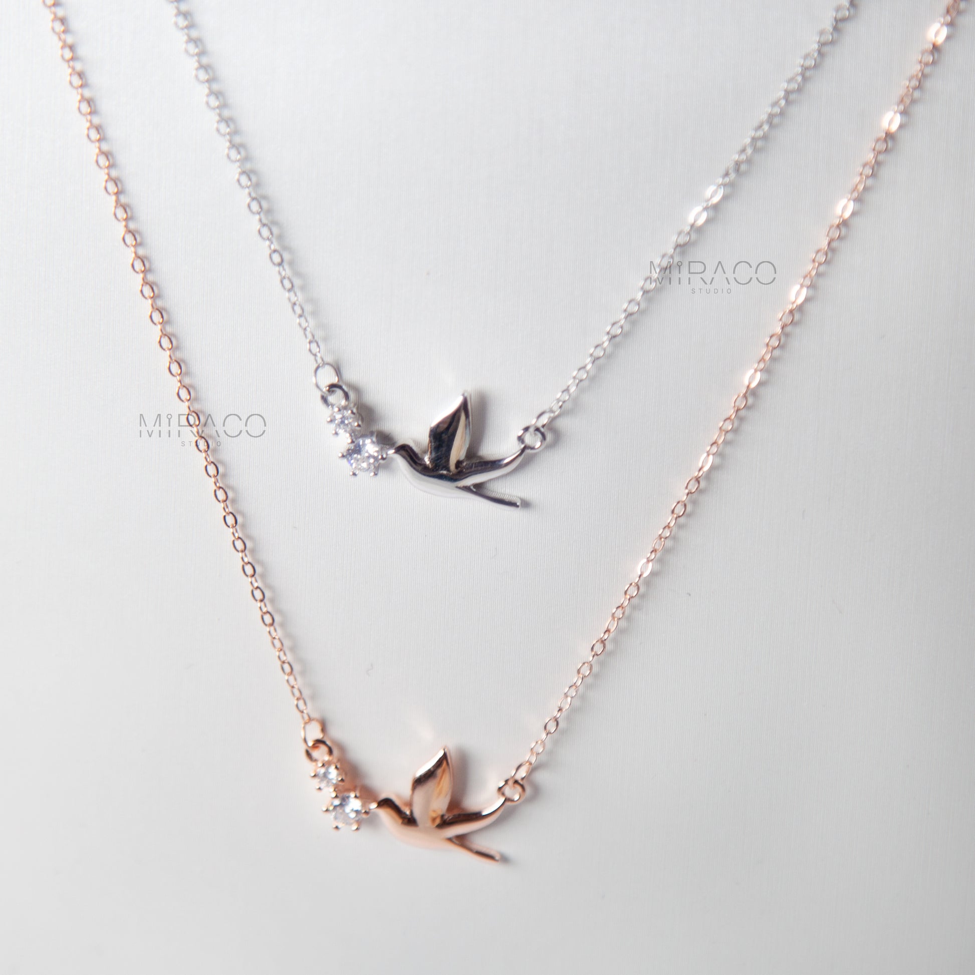 A Delicate Tribute to Freedom and Grace.

This beautifully crafted sterling silver necklace features a peaceful pigeon bird pendant, accented with a tiny diamond-style crystal for a soft, elegant shimmer. Available in both silver and rose gold finishes, this meaningful piece brings a sense of calm, love, and lightness to your everyday look.

Whether worn alone or layered, this necklace is a charming reminder of freedom, hope, and quiet strength.