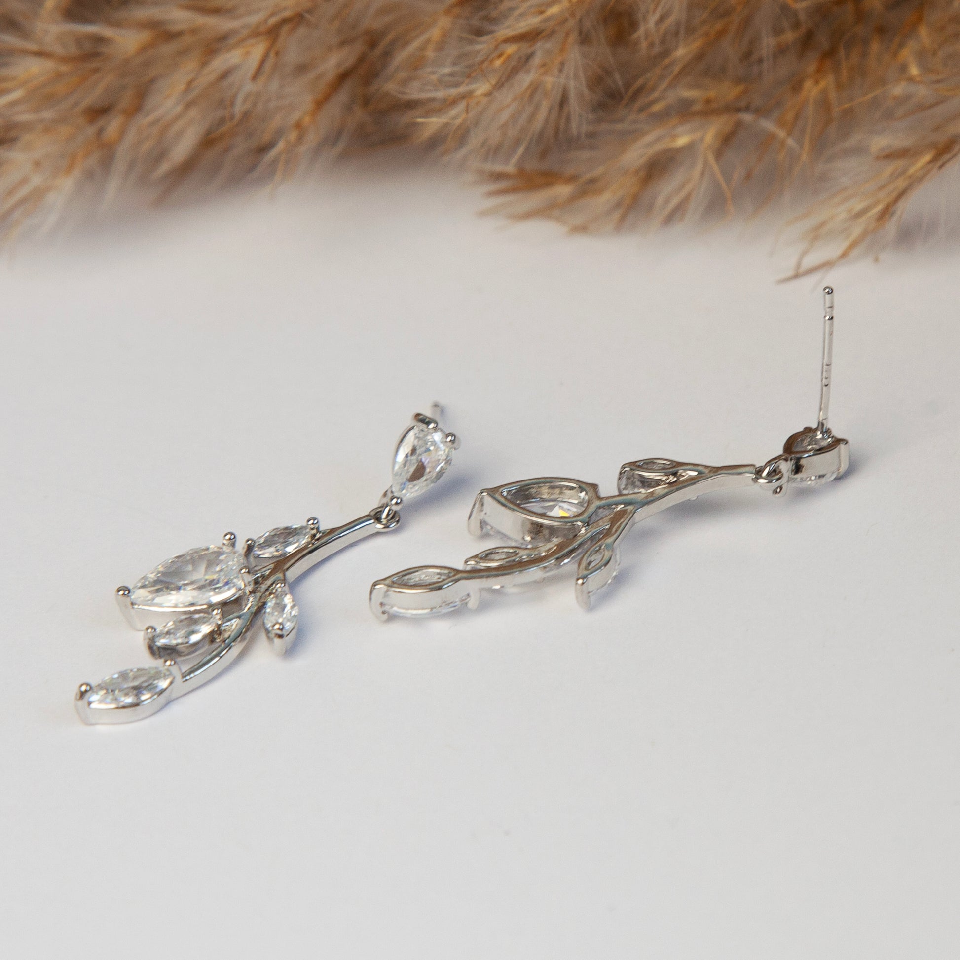 Clip On Diamond Earrings, Mini-Clip Dangle Earrings, Non-Pierced Plant Bridal Wedding Earrings

Our Mini-Clip Dangle Earrings are the perfect choice for those seeking subtle elegance or with small earlobes. Enjoy stylish charm and comfort in a compact design.