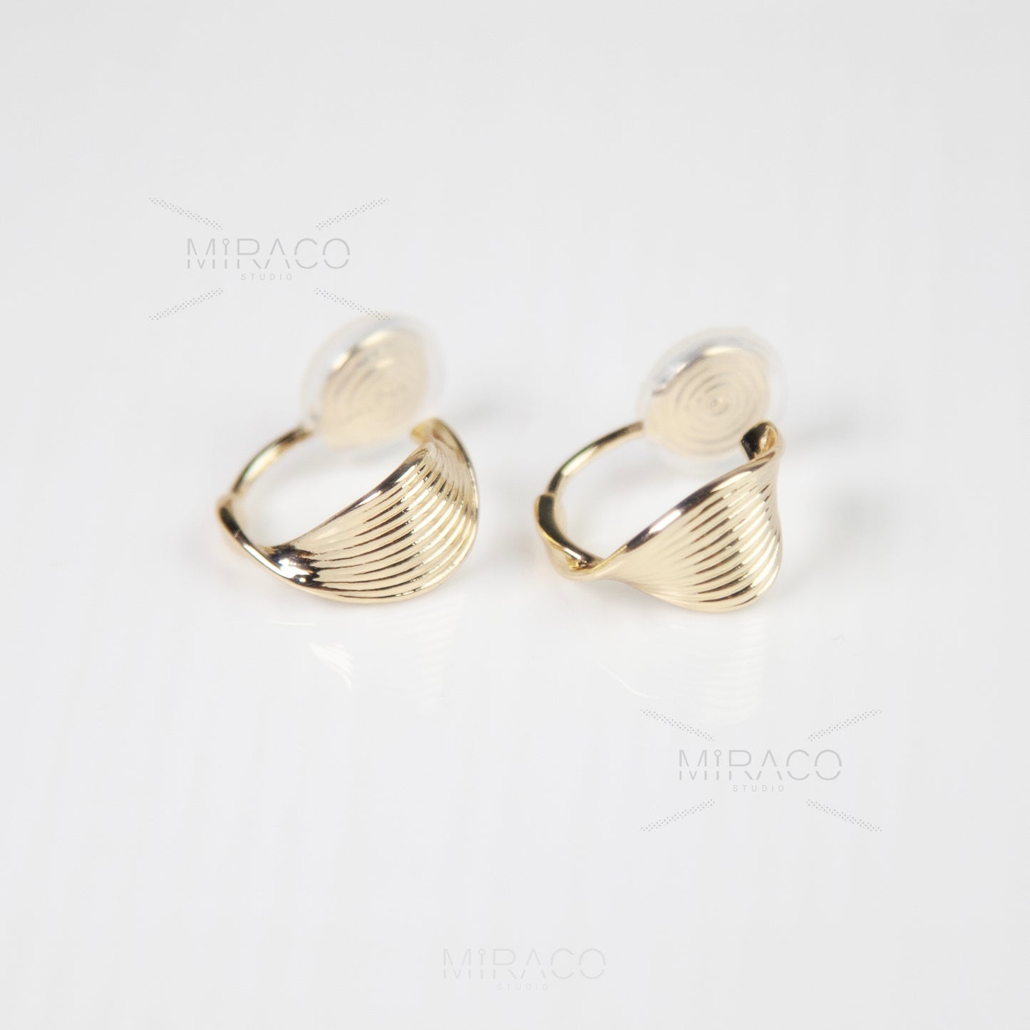 Twisted Hoop Clip On Earrings