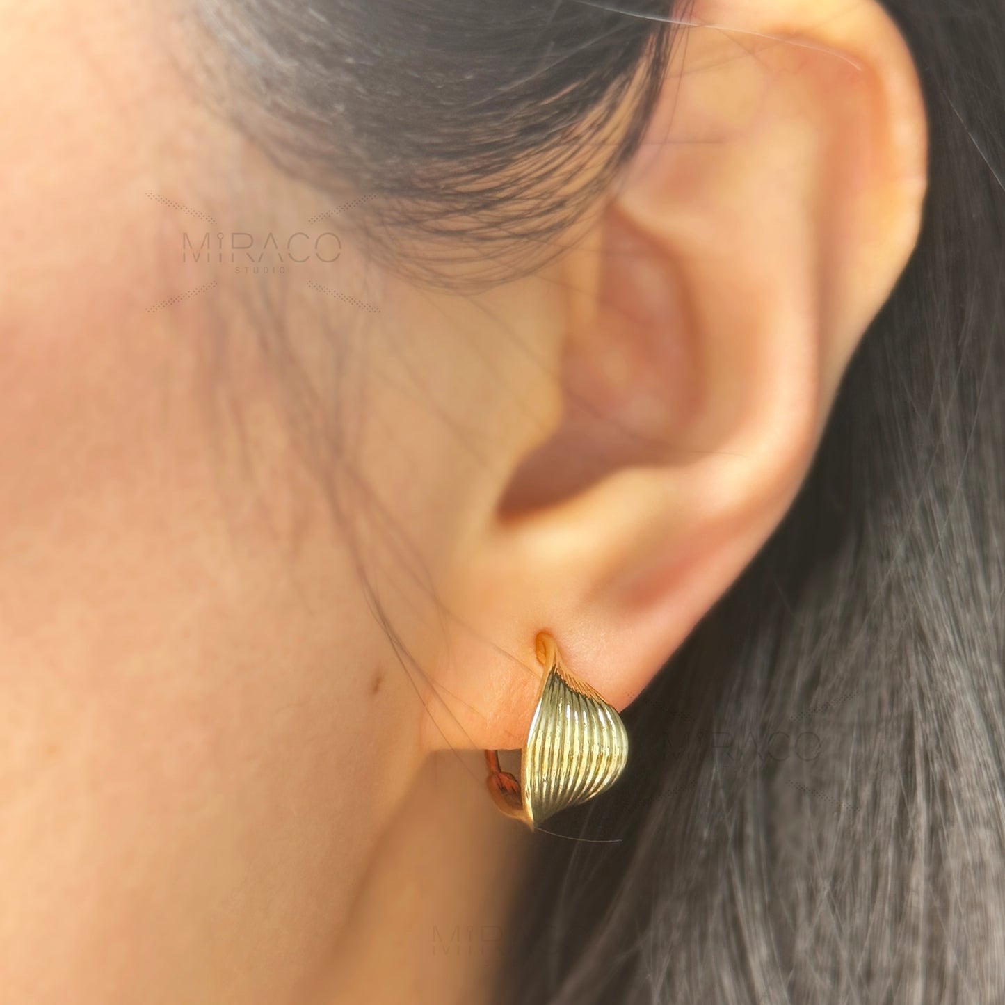 Twisted Hoop Clip On Earrings
