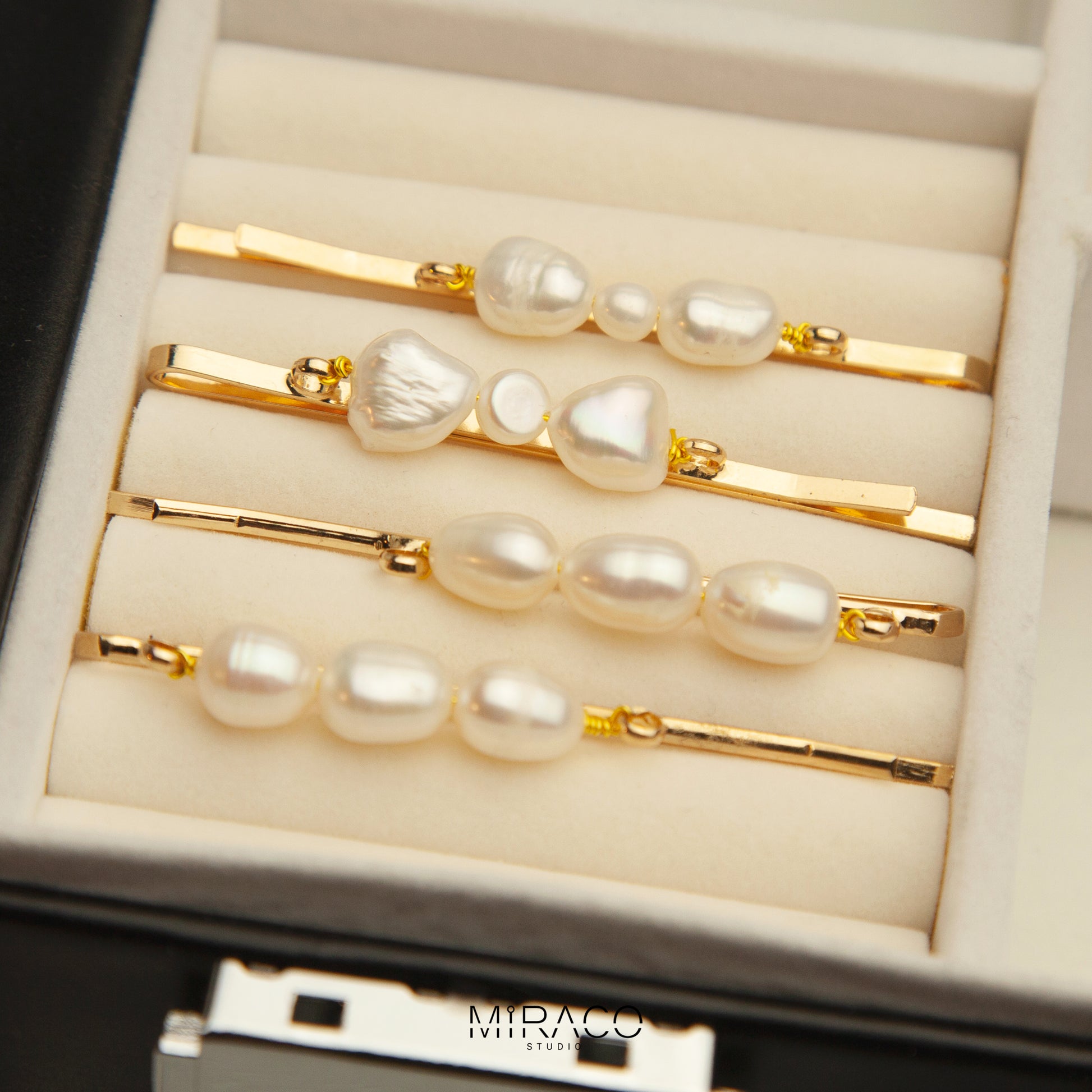 Gold-Toned Pearl Barrette with Irregular Shaped Pearls, Bridal Hair Clips Wedding Hair Accessories

• Materials: freshwater pearls

• Size:&nbsp;
A: 60mm pin with three sames size pearls 7-8mm freshwater pearls
B: 60mm pin with bowknot shape two 7-8mm one small 4-5mm freshwater pearls

• Sold as a set of 2 clips

Please note every single pearls are unique with nature flaws, not in perfect round shape.&nbsp;