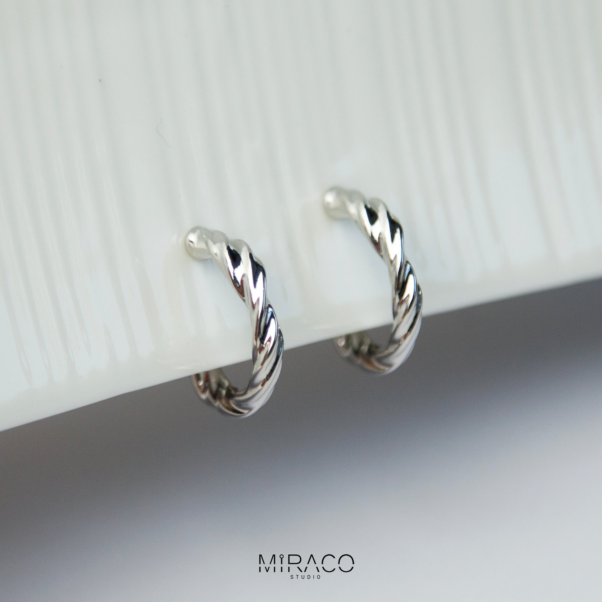Silver Twisted Hoop Clip On Earrings