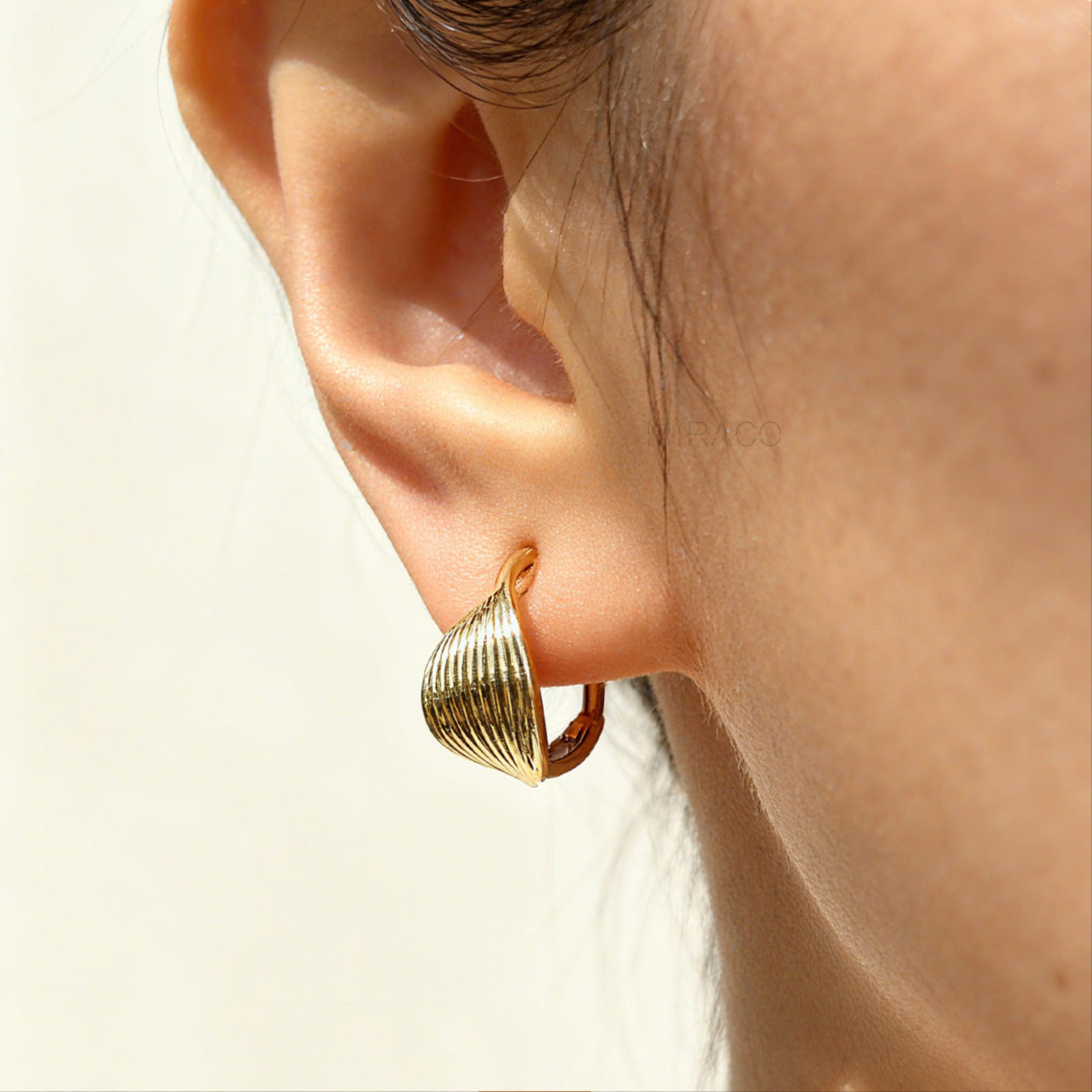 Twisted Hoop Clip On Earrings
