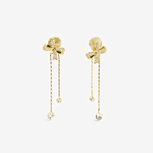 Gold earrings with bow designs and dangling elements clip on earrings dangle drop earrings
