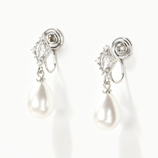Pair of silver-plated coil back clip-on earrings with a Marquise CZ dangle and a pear-shaped faux pearl drop, shown next to the identical gold-plated version.