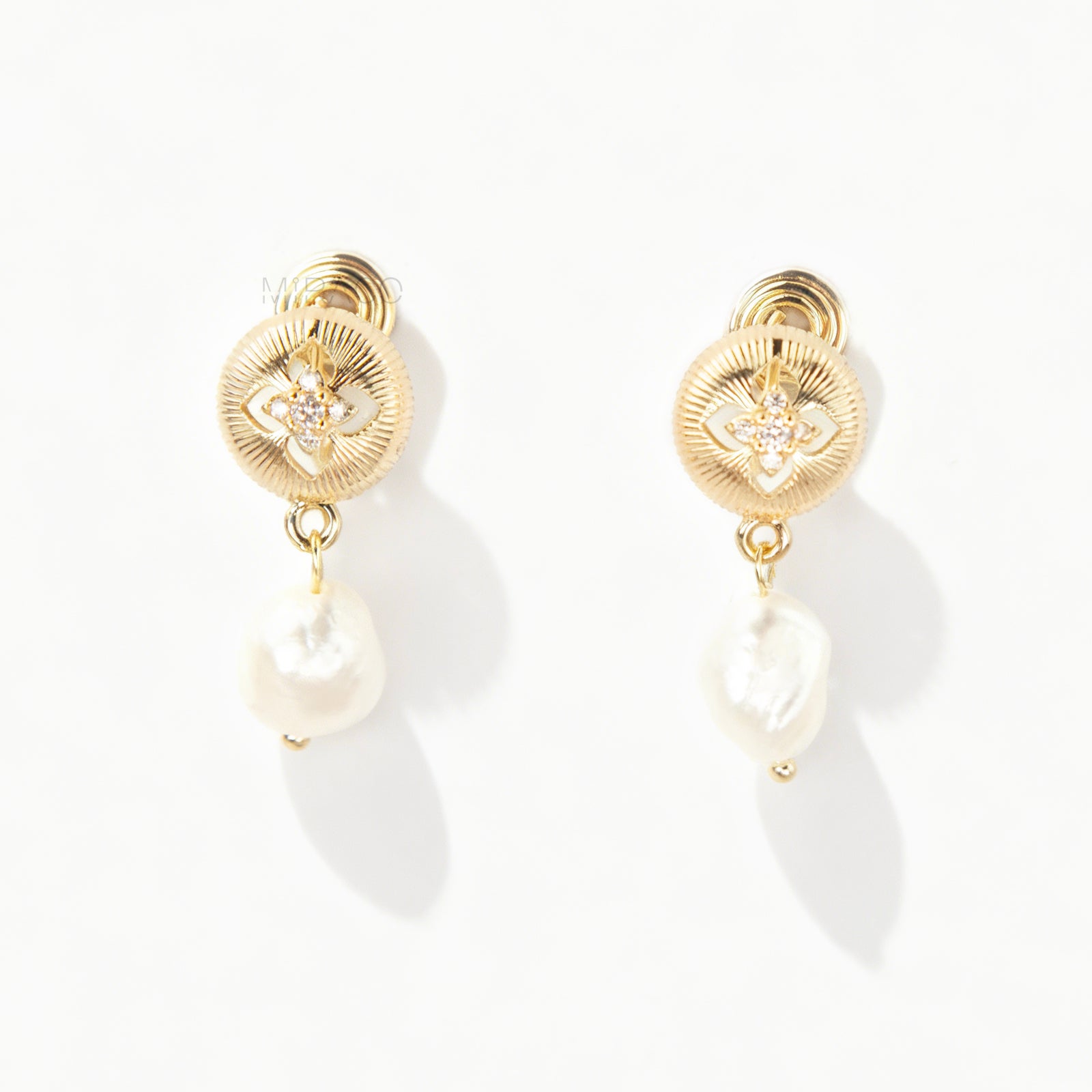 Gold plated baroque pearl dangle clip-on earrings with secure coil back closure for non-pierced ears