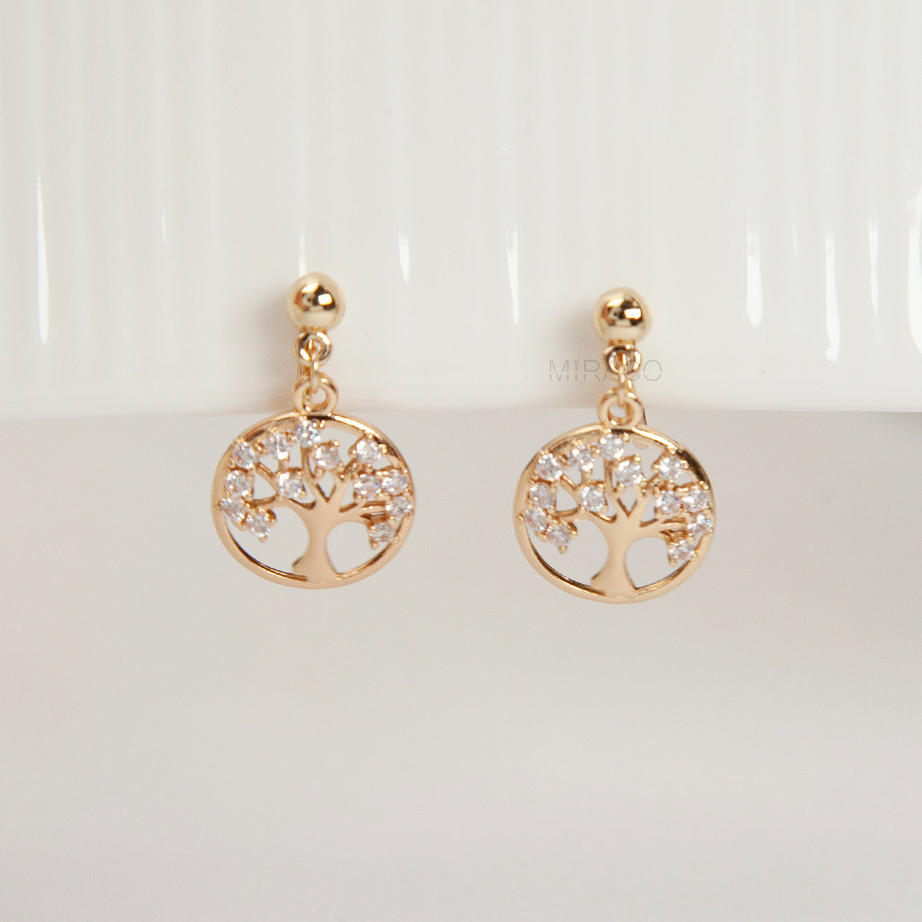 Gold tree-shaped clip on earrings 