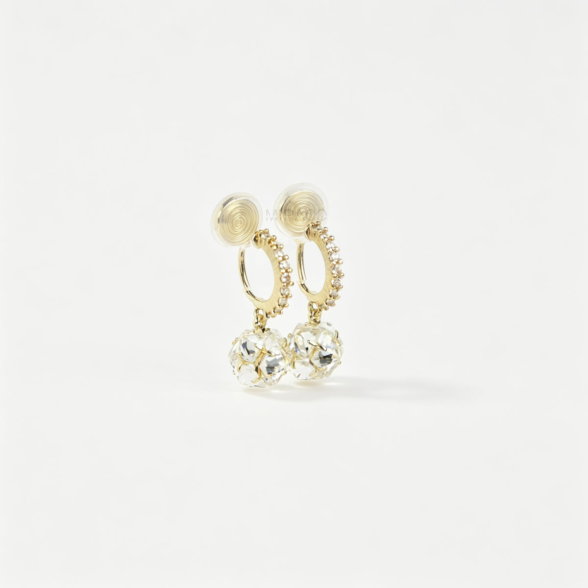 Pair of gold-toned non-pierced clip-on hoop earrings with pavé crystals, clear faceted glass sphere drops, and spiral coil backs with silicone pads.