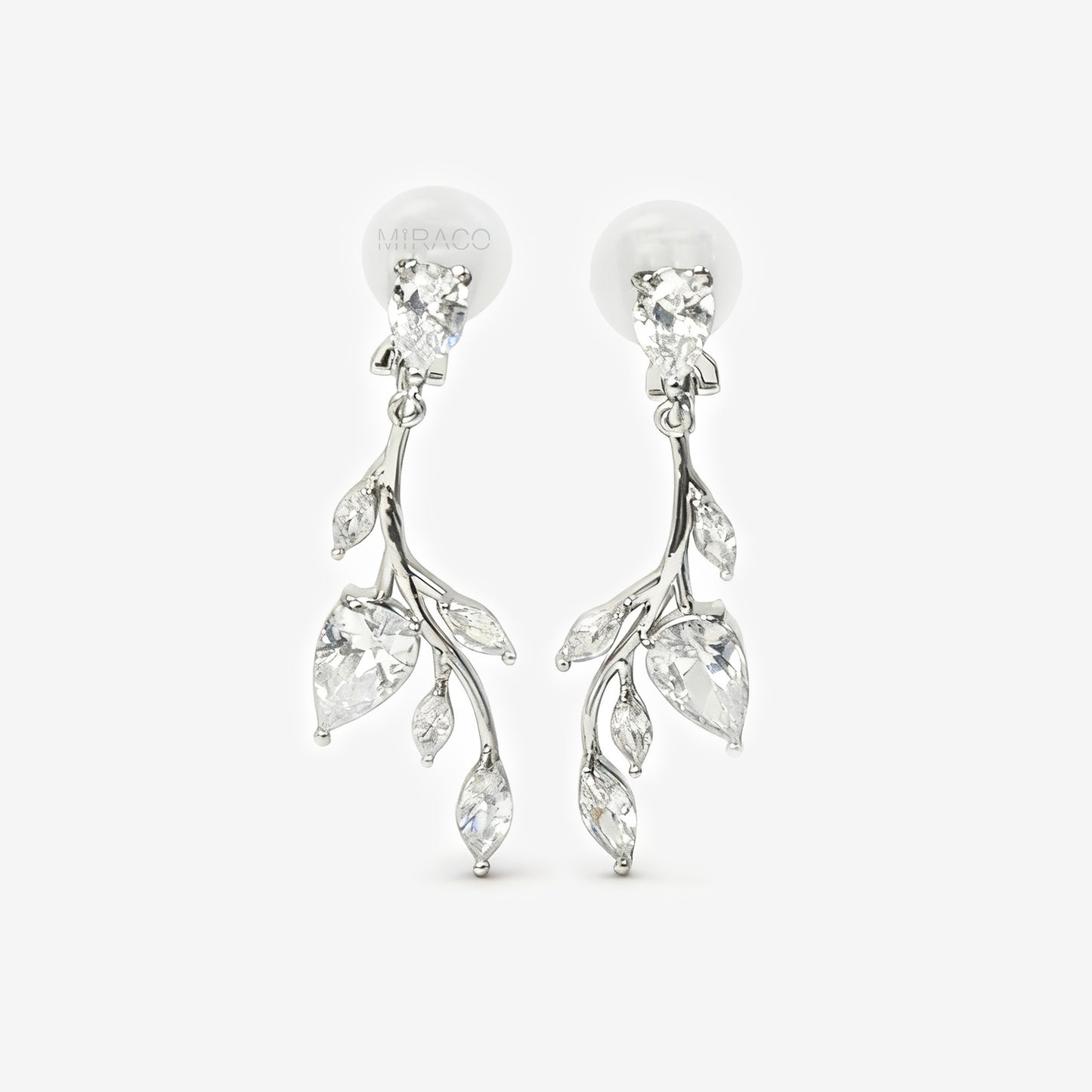 Pair of silver-tone vine leaf dangle clip-on earrings with Mini-Clip closure and sparkling Cubic Zirconia stones.