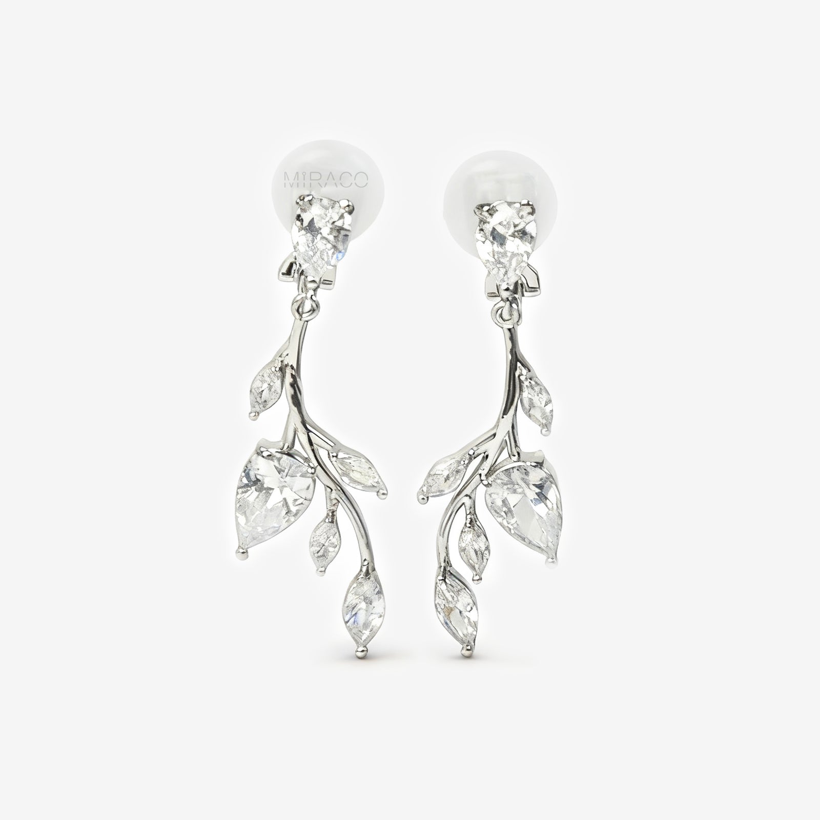 Pair of silver-tone vine leaf dangle clip-on earrings with Mini-Clip closure and sparkling Cubic Zirconia stones.