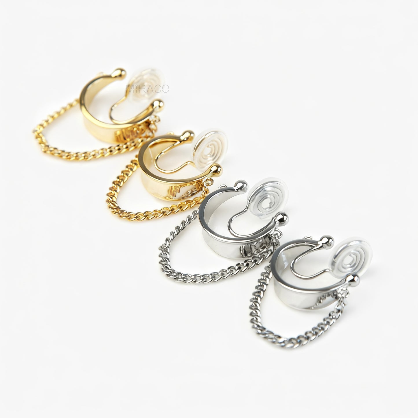 Hoop Clip-On Earrings with a Draped Chain, two in gold-tone and two in silver-tone, showing the Spring Coil Back.
