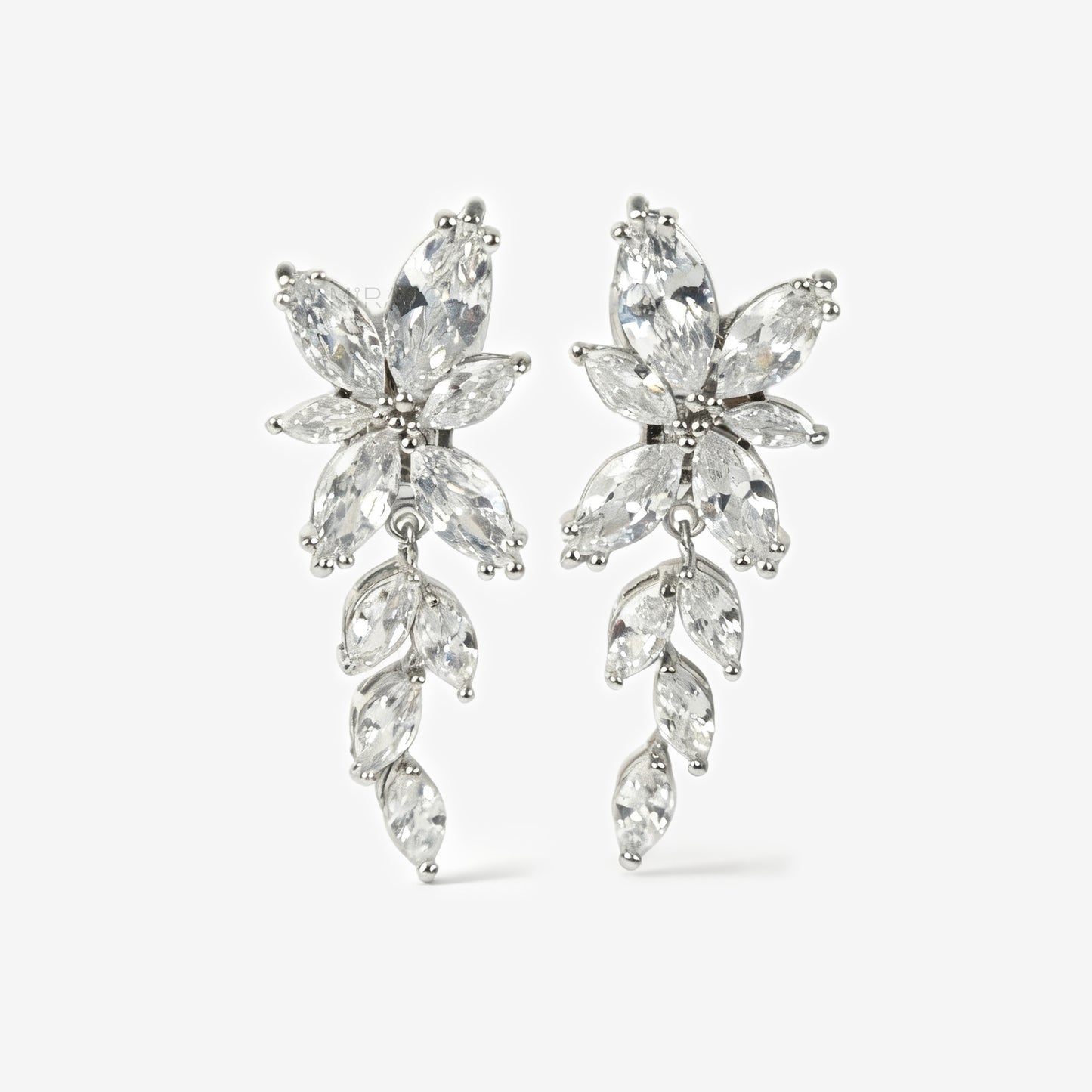 Large silver leaf clip-on earrings with diamond sparkle. Dangle drop design with mini-clip backs. Bold, lightweight, and perfect for non-pierced ears.