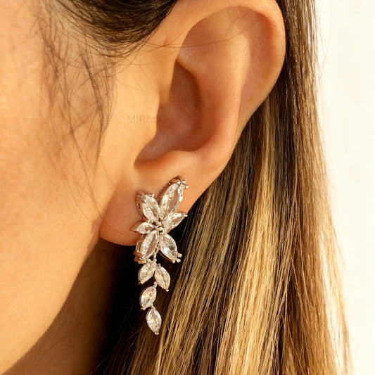 Large silver leaf clip-on earrings with diamond sparkle. Dangle drop design with mini-clip backs. Bold, lightweight, and perfect for non-pierced ears.