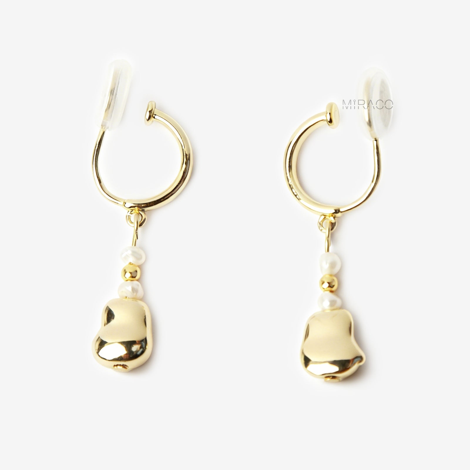 Minimalist Clip On Earrings, Gold Bean Dangle Non Pierced Freshwater Pearls Earrings.&nbsp;

Experience elegance with our Clip On Dangle Hoop Earrings. These gold earrings feature real pearls and metal beads, making them perfect for any occasion. Easily clip them on and enjoy the added style and beauty they bring. Upgrade your accessories with our sophisticated dangle hoop earrings.