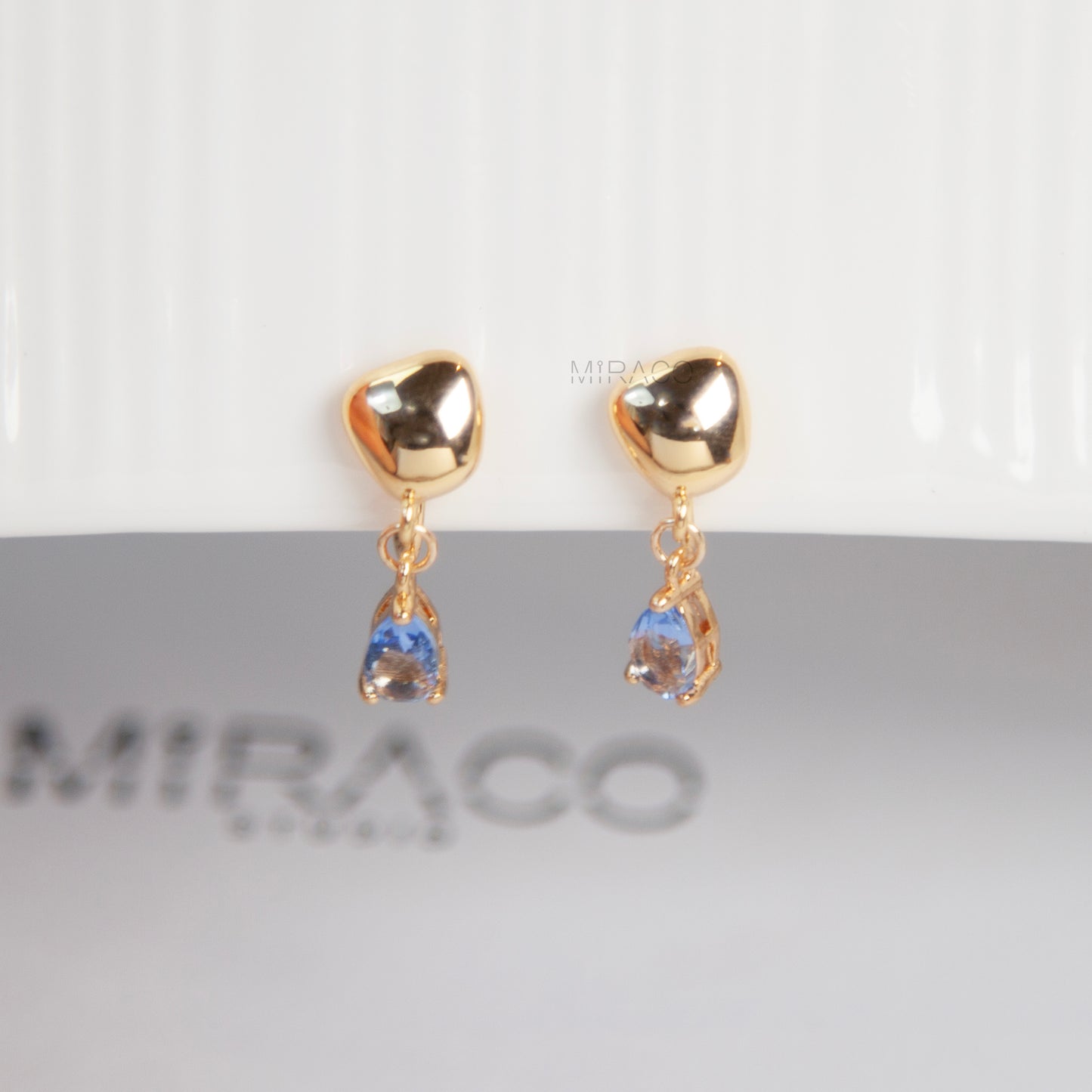 Modern Gold Clip-On Earrings – Blue Teardrop Crystal Dangle