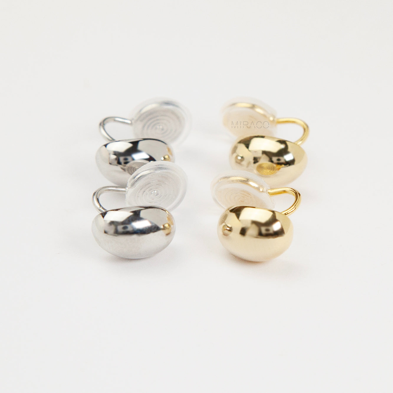 clip-on earrings, silver clip-on earrings, gold clip-on earrings, oval stud earrings, minimalist earrings, non-pierced earrings, U-shape coil clip-on, everyday stud earrings, polished oval earrings, lightweight clip-on earrings