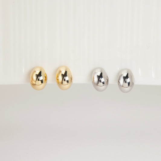 clip-on earrings, silver clip-on earrings, gold clip-on earrings, oval stud earrings, minimalist earrings, non-pierced earrings, U-shape coil clip-on, everyday stud earrings, polished oval earrings, lightweight clip-on earrings