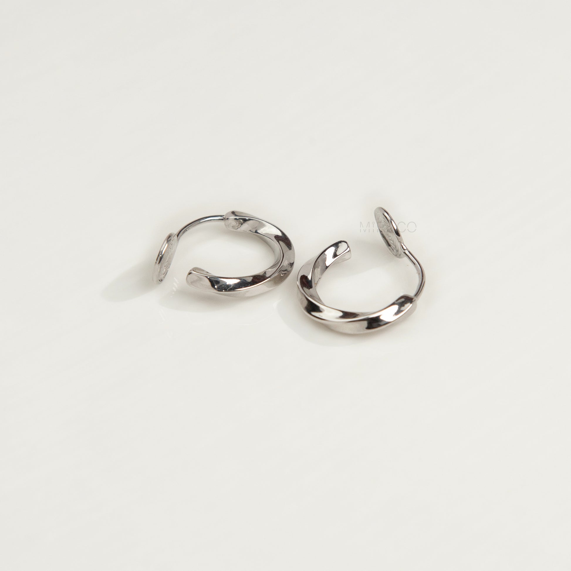 silver clip-on hoop earrings, twisted hoop earrings, 18mm hoop clip-ons, non pierced silver earrings, small silver hoops clip-on, everyday hoop earrings, coil clip-on earrings, classic hoop earrings no piercing