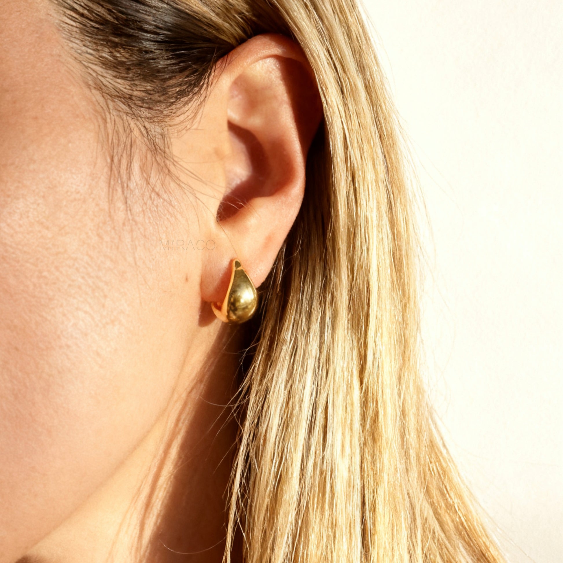 teardrop clip-on hoop earrings, dome hoop earrings silver gold, non pierced clip-on earrings, coil back teardrop earrings, gold clip-on hoops, silver dome hoops, teardrop earrings without piercing, classic everyday clip-ons