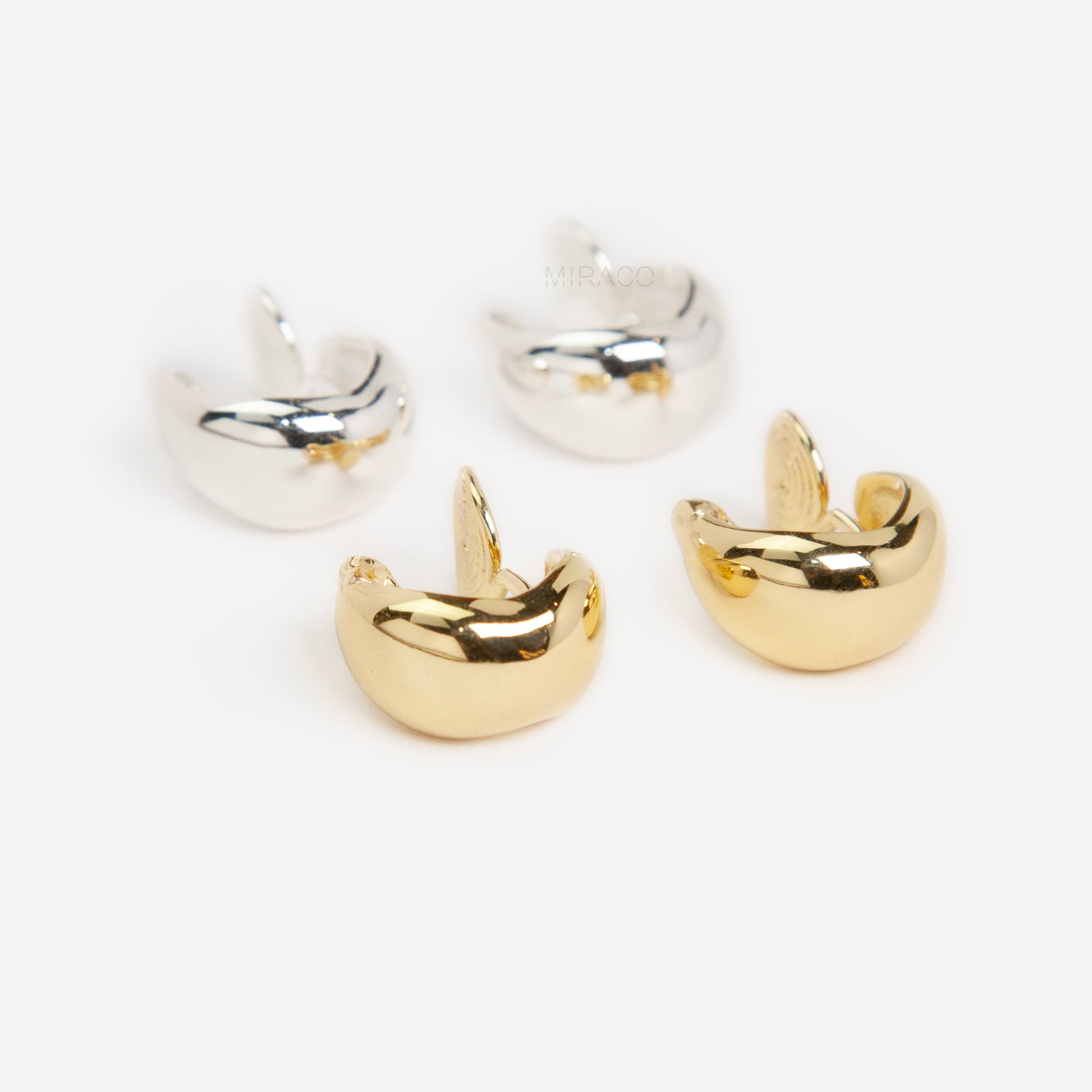 teardrop clip-on hoop earrings, dome hoop earrings silver gold, non pierced clip-on earrings, coil back teardrop earrings, gold clip-on hoops, silver dome hoops, teardrop earrings without piercing, classic everyday clip-ons