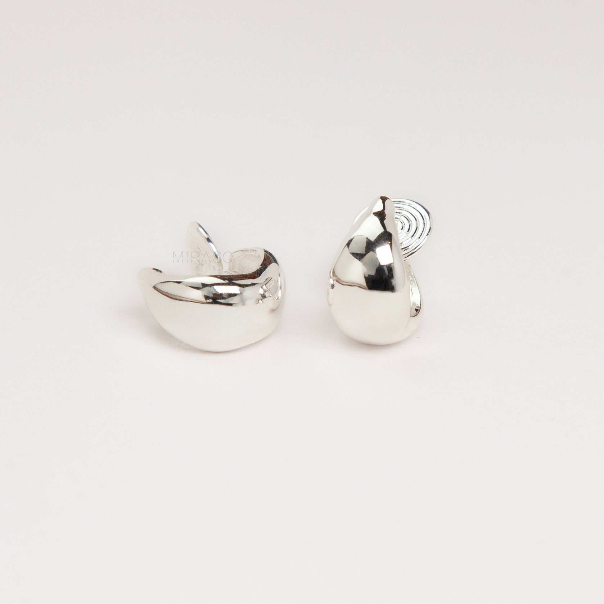 teardrop clip-on hoop earrings, dome hoop earrings silver gold, non pierced clip-on earrings, coil back teardrop earrings, gold clip-on hoops, silver dome hoops, teardrop earrings without piercing, classic everyday clip-ons
