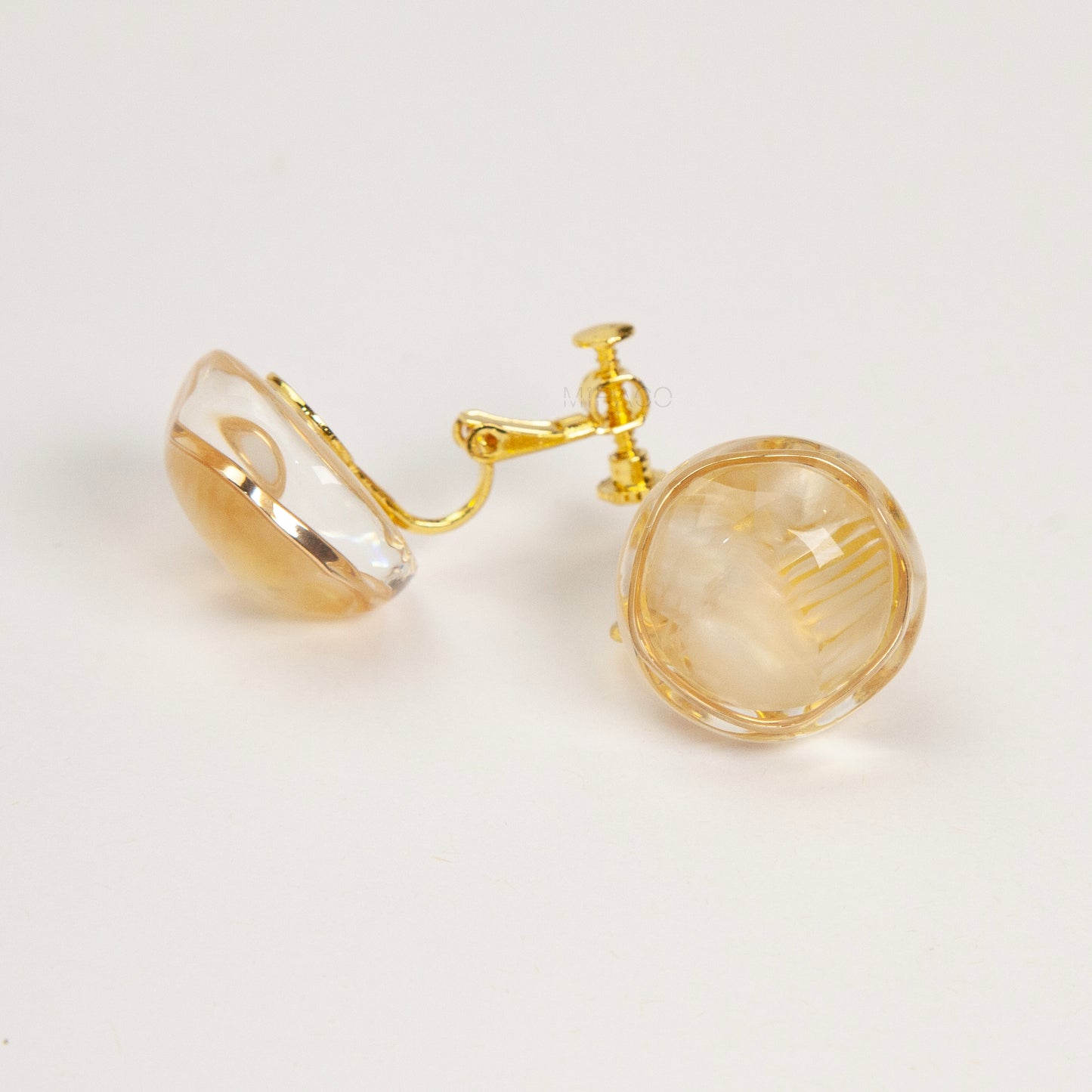 round resin clip-on earrings, gold screw back earrings non pierced, marbled dome earrings, clear resin clip-on studs, screw back clip earrings, statement clip-on earrings, non pierced gold earrings