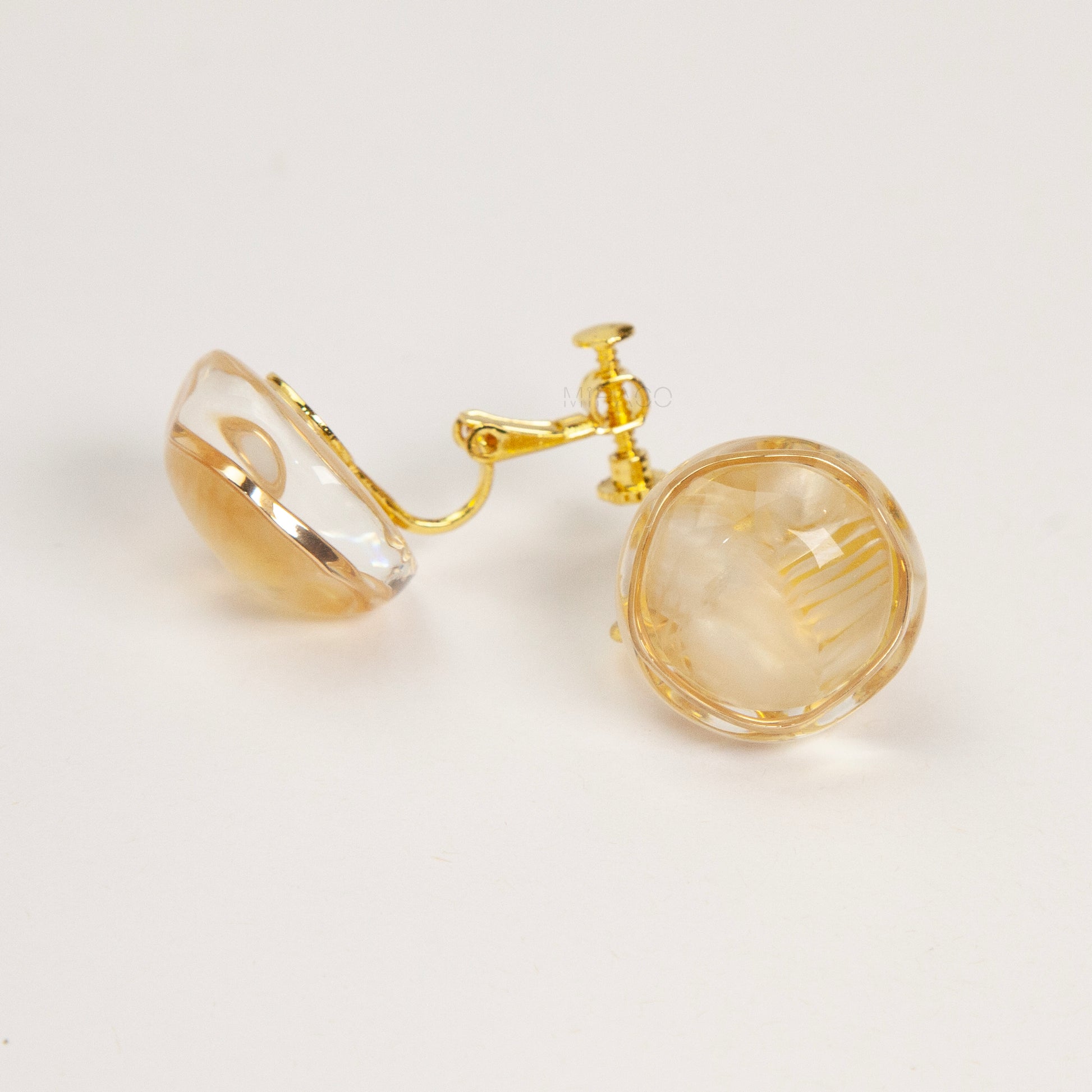 round resin clip-on earrings, gold screw back earrings non pierced, marbled dome earrings, clear resin clip-on studs, screw back clip earrings, statement clip-on earrings, non pierced gold earrings