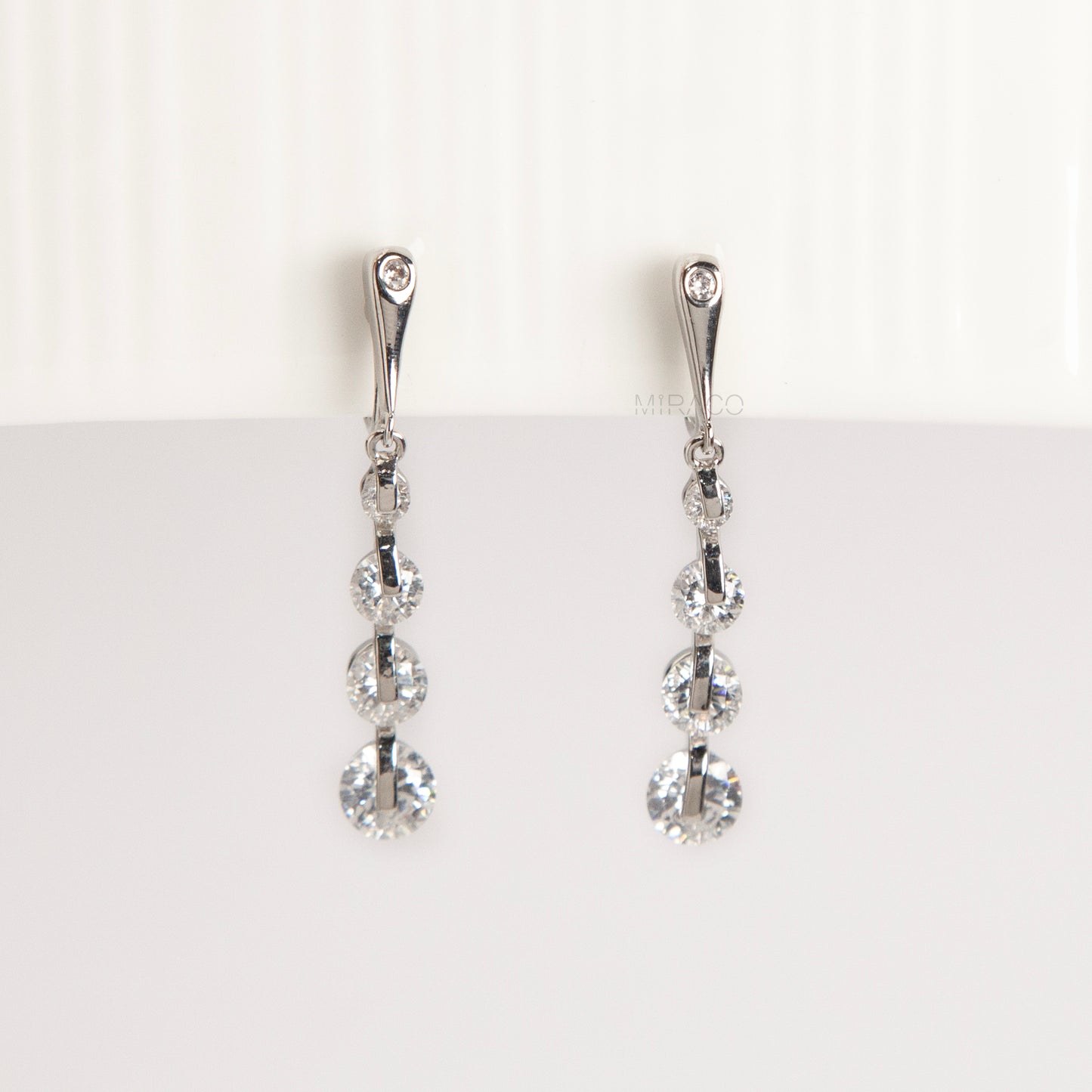 silver dangle clip-on earrings, non pierced diamond drop earrings, crystal clip on earrings, silver coil back earrings, dangling clip on earrings