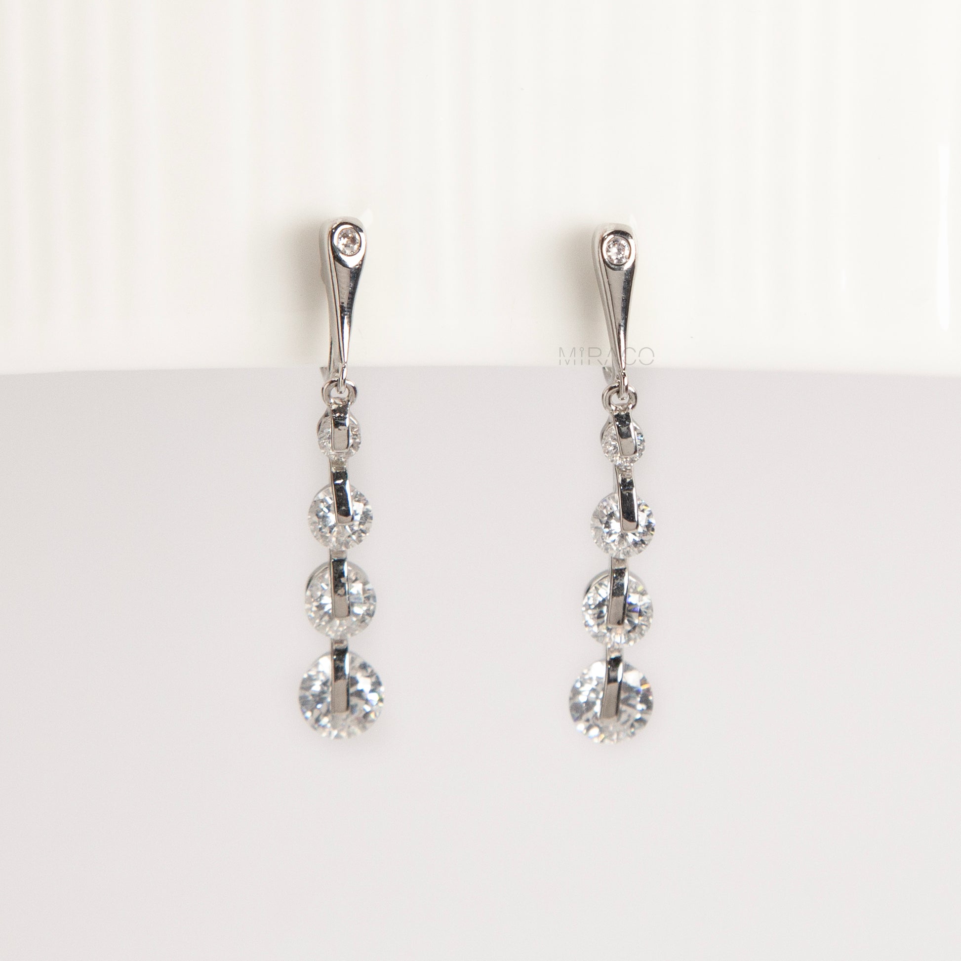 silver dangle clip-on earrings, non pierced diamond drop earrings, crystal clip on earrings, silver coil back earrings, dangling clip on earrings