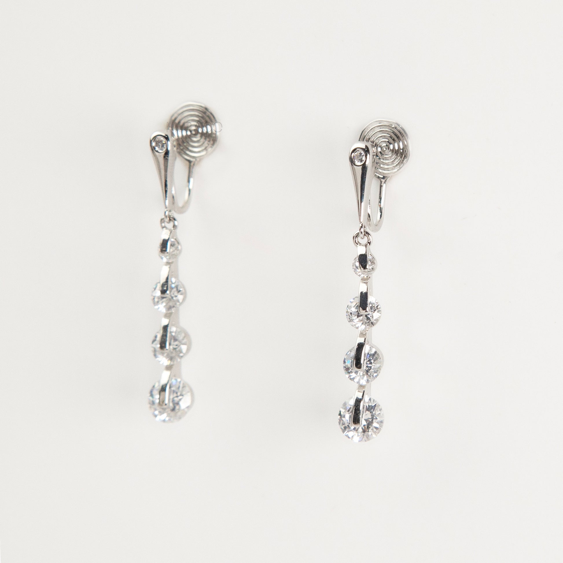 silver dangle clip-on earrings, non pierced diamond drop earrings, crystal clip on earrings, silver coil back earrings, dangling clip on earrings